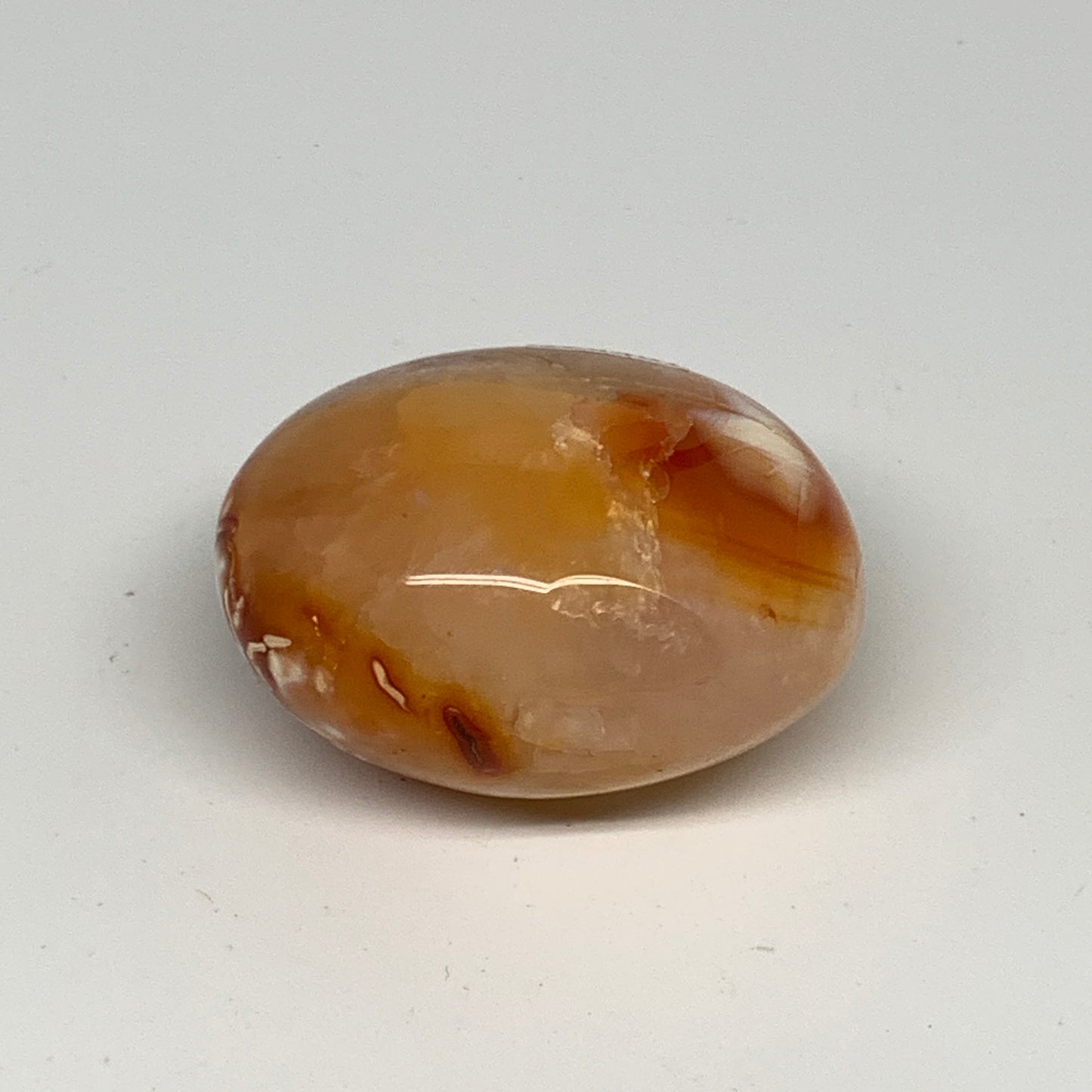 102.7g, 2.1"x1.7"x0.3", Red Carnelian Palm-Stone Gem Crystal Polished, B28461