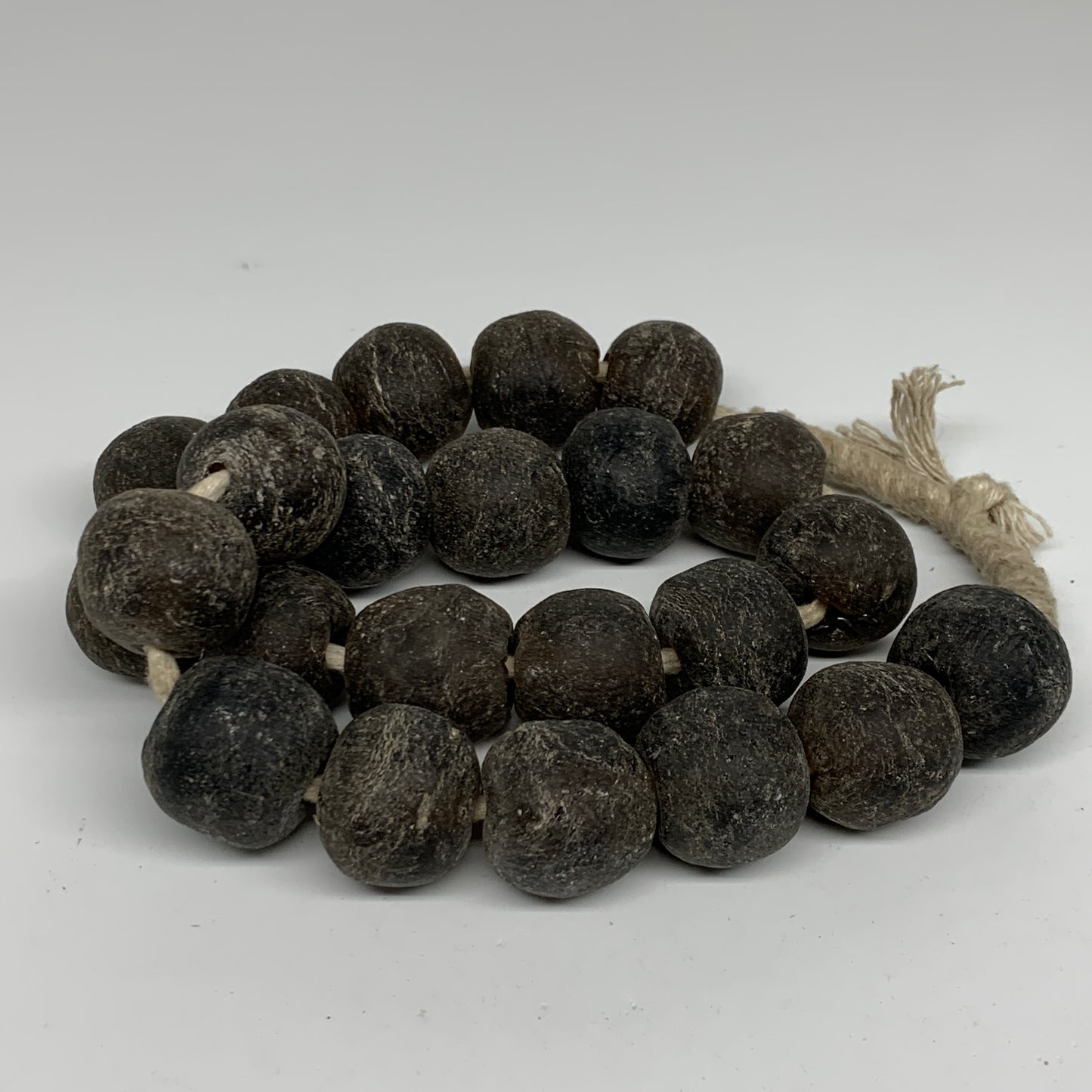 1.89 lbs, 25mm-30mm, 1 Strand, 23 beads, Green/gray Sea Glass Beads, B35696