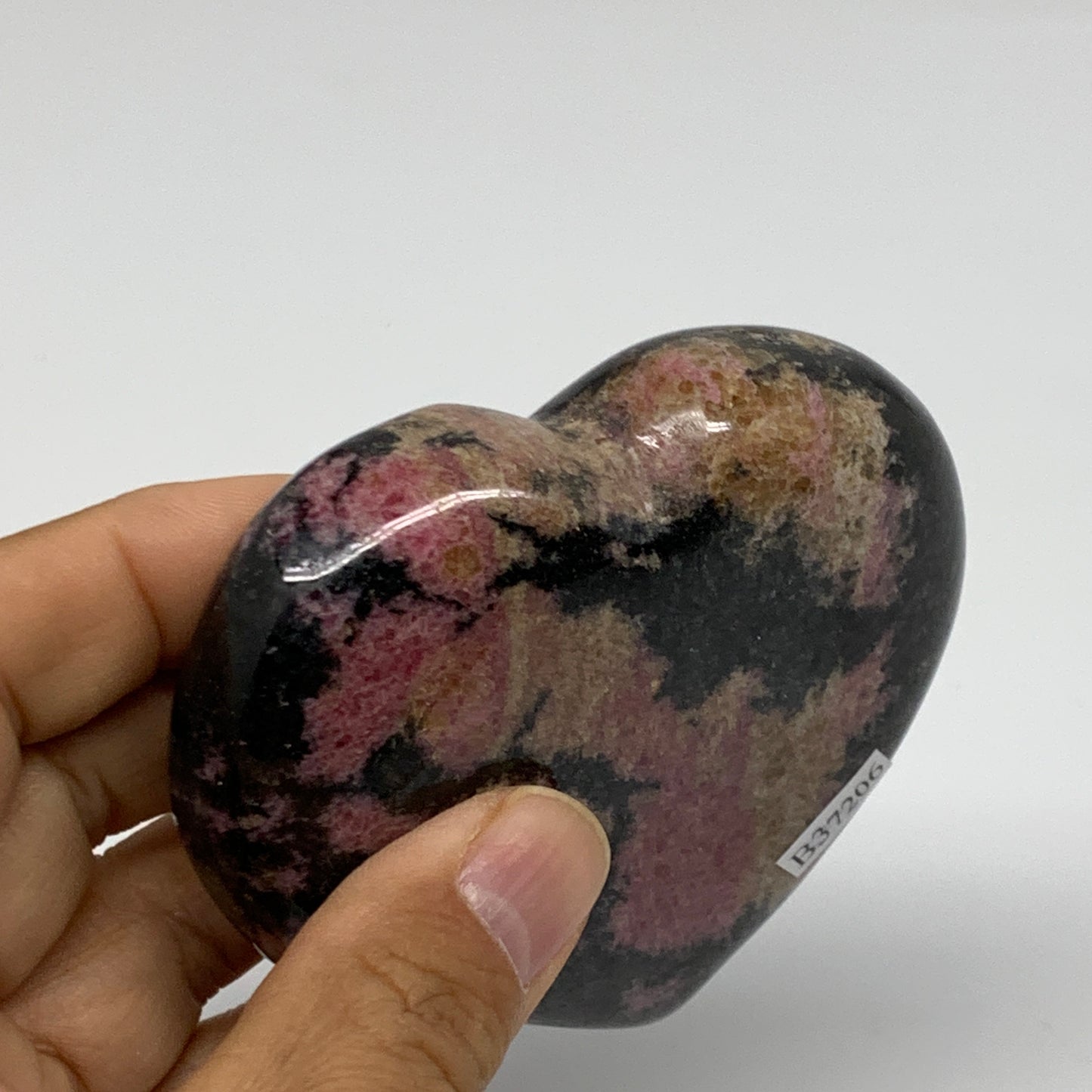 0.62 lbs, 2.8"x3.2"x0.9", Natural Rhodonite Heart Polished Crystal, B37206