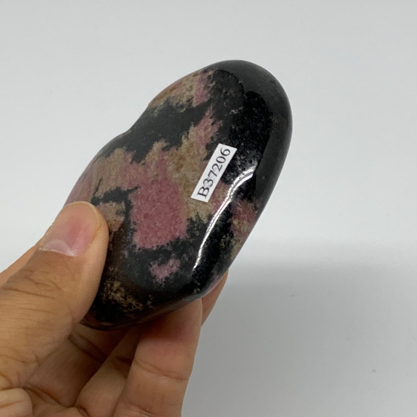 0.62 lbs, 2.8"x3.2"x0.9", Natural Rhodonite Heart Polished Crystal, B37206