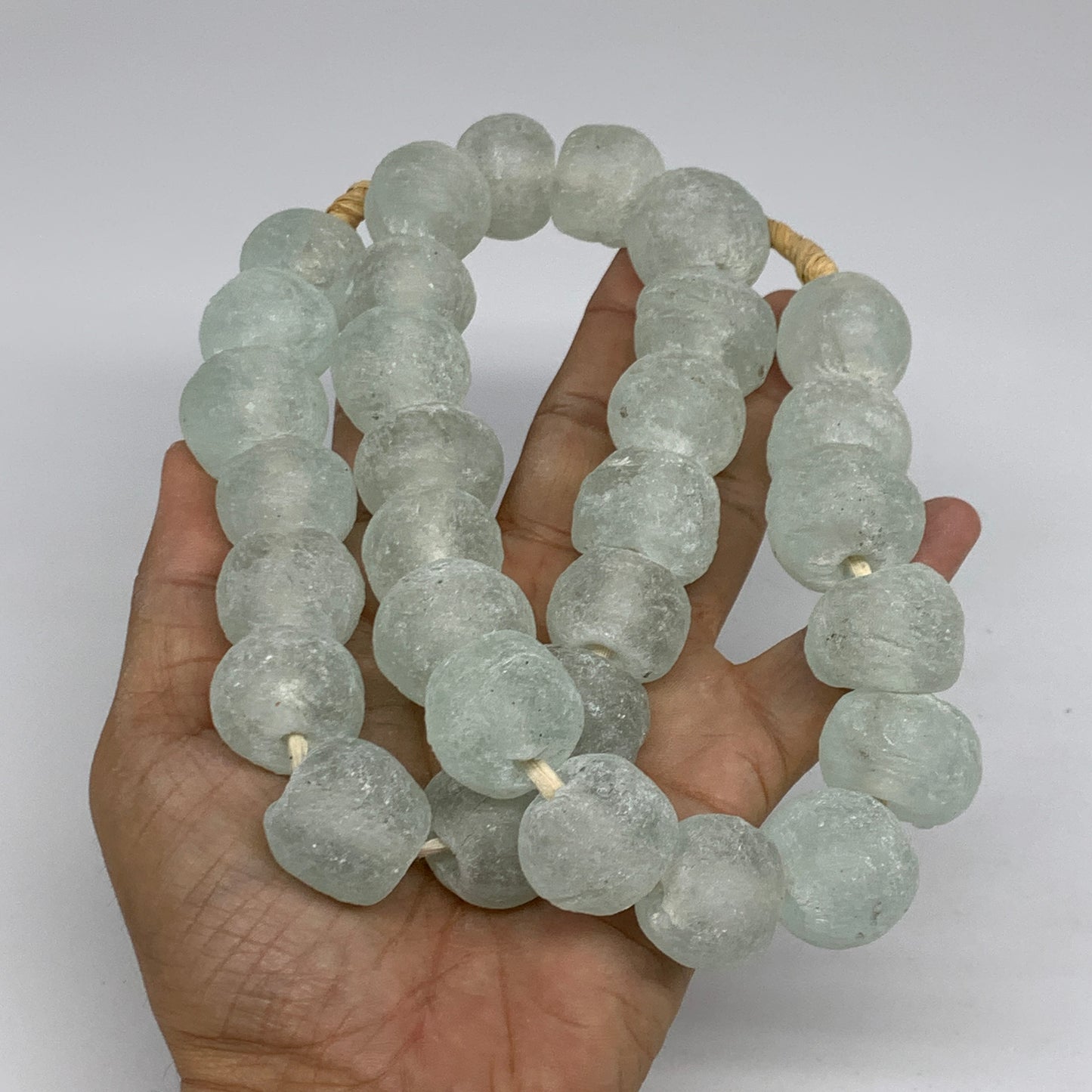 0.95 lbs, 15mm-24mm, 1 Strand, 31 beads, Green/Blue Sea Glass Beads, B35704