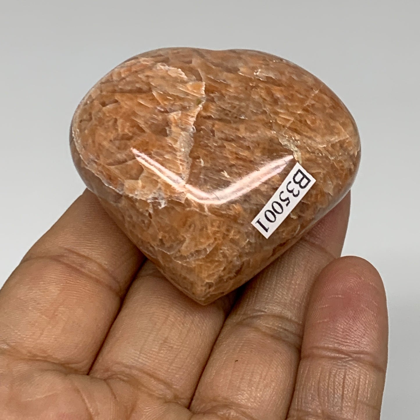 87.5g, 1.9"x2"x1.1", Peach Moonstone Heart Crystal Polished, B35001
