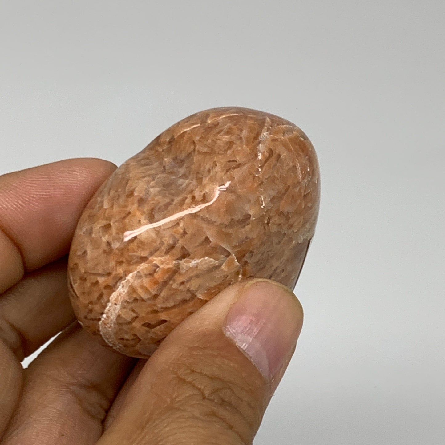 87.5g, 1.9"x2"x1.1", Peach Moonstone Heart Crystal Polished, B35001