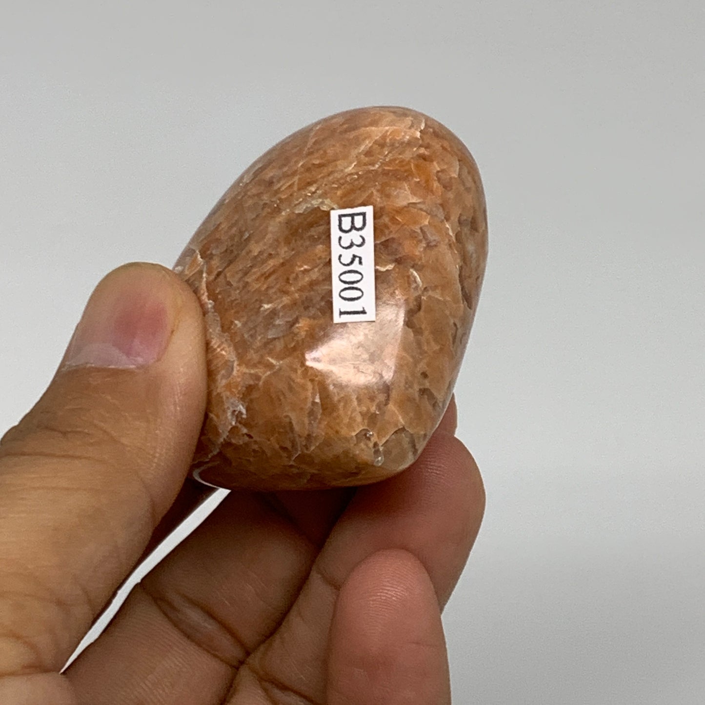 87.5g, 1.9"x2"x1.1", Peach Moonstone Heart Crystal Polished, B35001