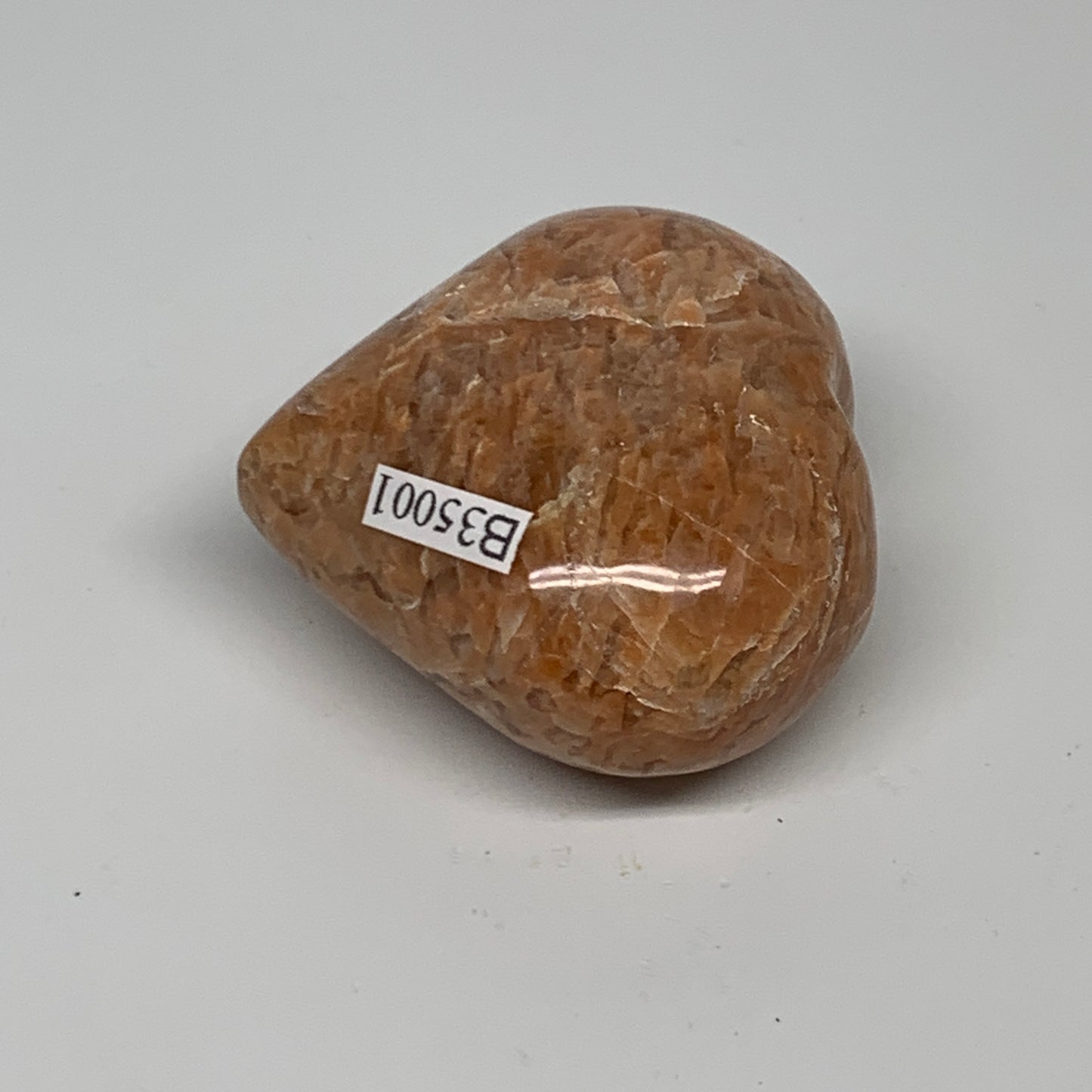 87.5g, 1.9"x2"x1.1", Peach Moonstone Heart Crystal Polished, B35001