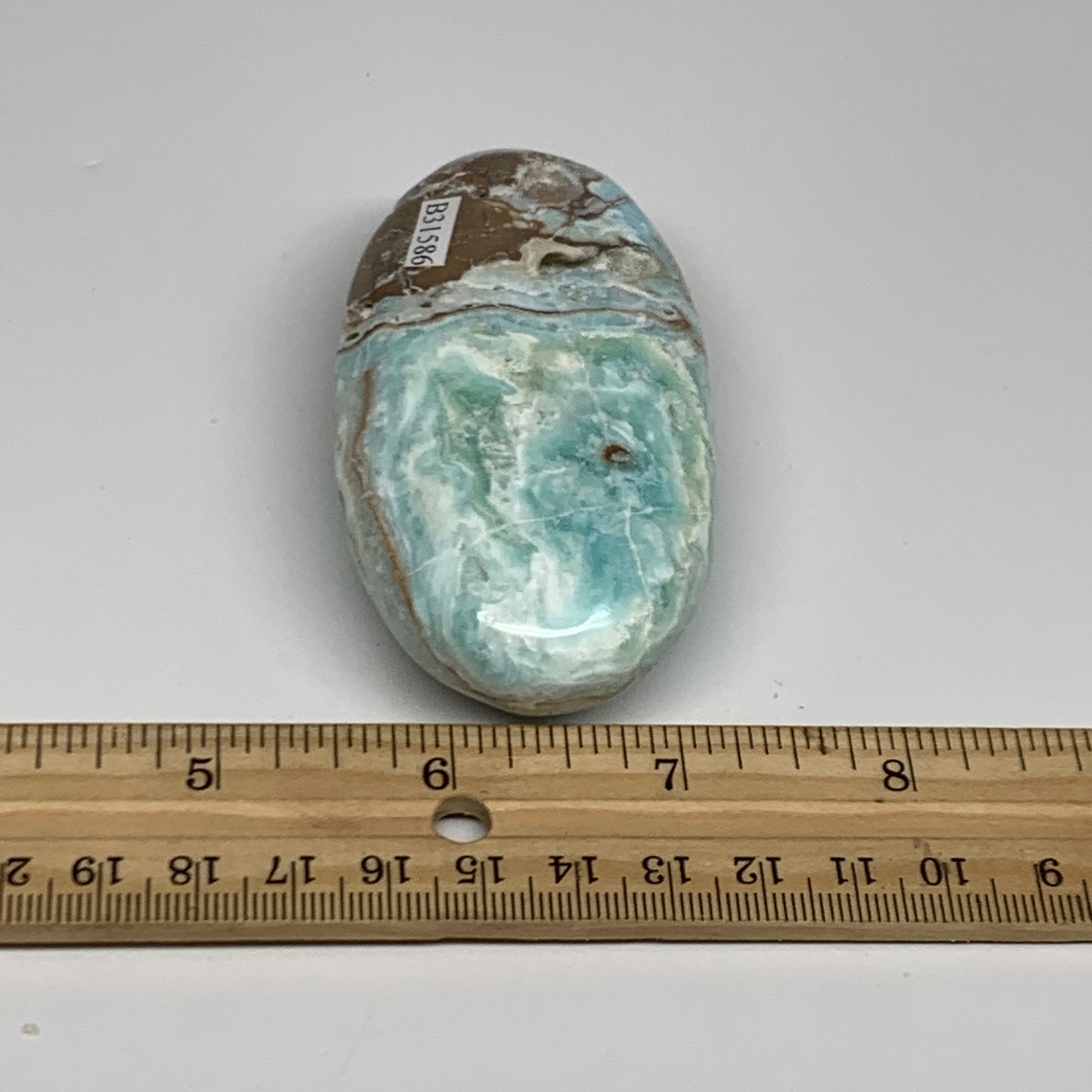 144.9g, 3.3"x1.7”x0.9", Blue Aragonite Calcite Palm-Stone @Afghanistan, B31586