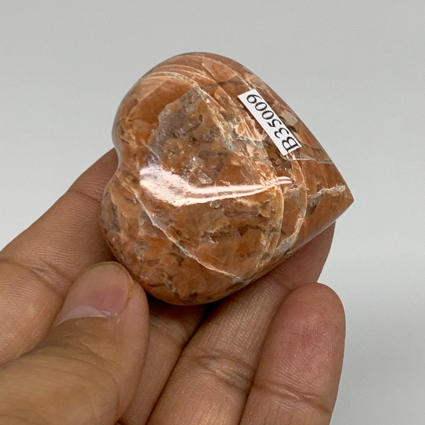 64.6g, 1.8"x1.9"x0.9", Peach Moonstone Heart Crystal Polished, B35009