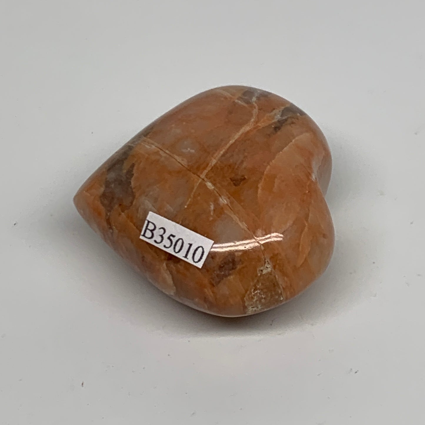 74.6g, 1.8"x2"x1", Peach Moonstone Heart Crystal Polished, B35010