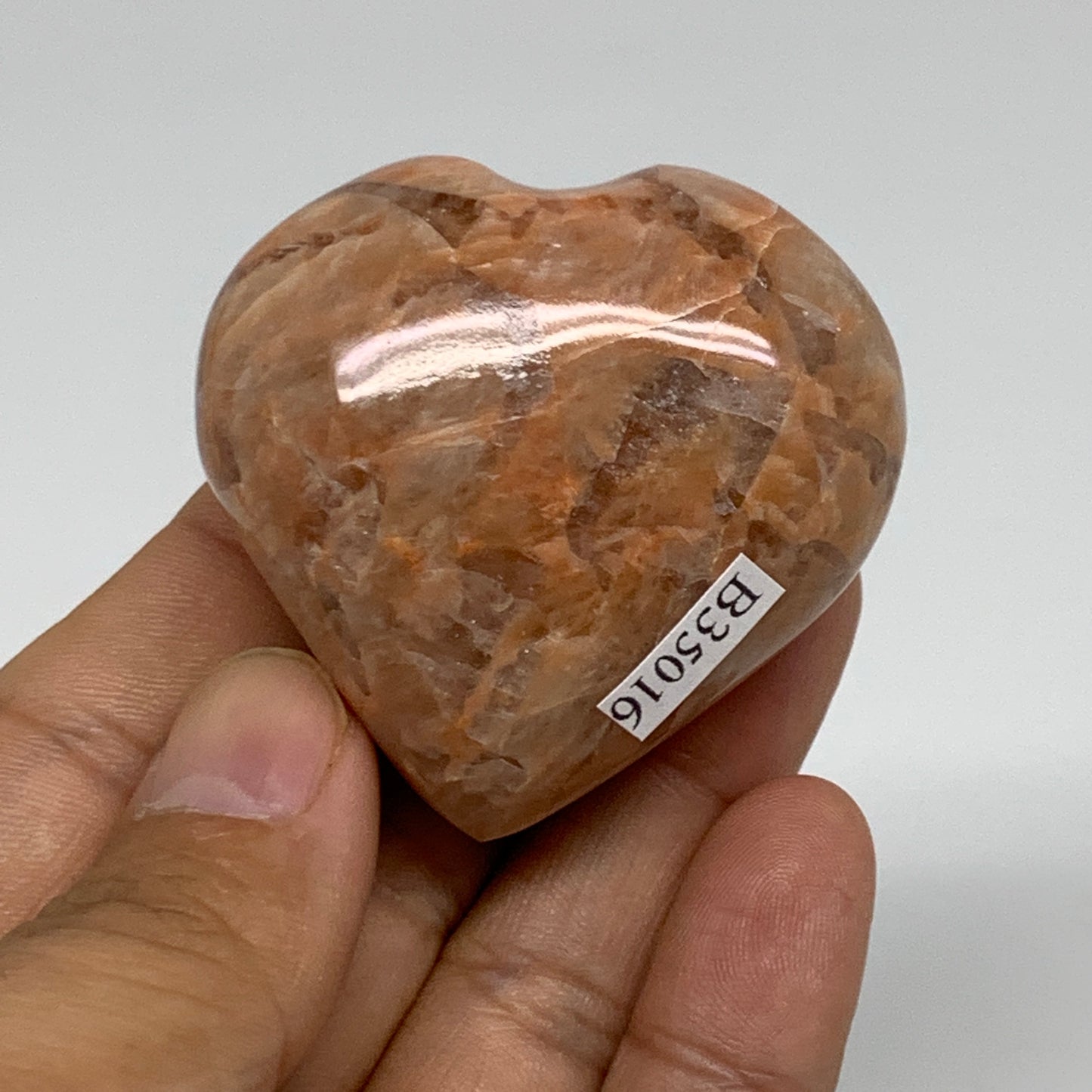 79.4g, 1.8"x1.9"x1.1", Peach Moonstone Heart Crystal Polished, B35016
