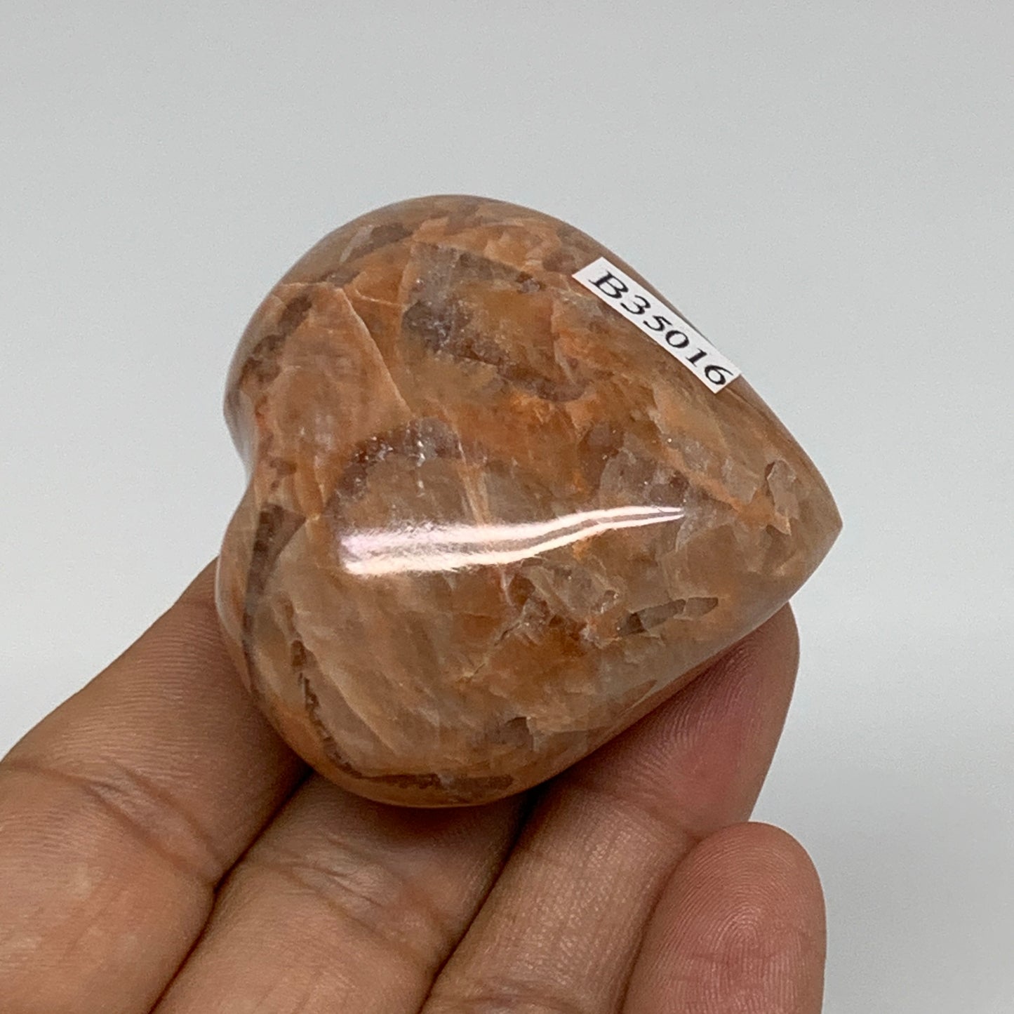 79.4g, 1.8"x1.9"x1.1", Peach Moonstone Heart Crystal Polished, B35016