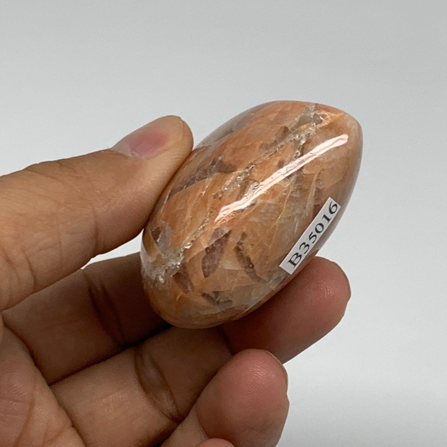 79.4g, 1.8"x1.9"x1.1", Peach Moonstone Heart Crystal Polished, B35016