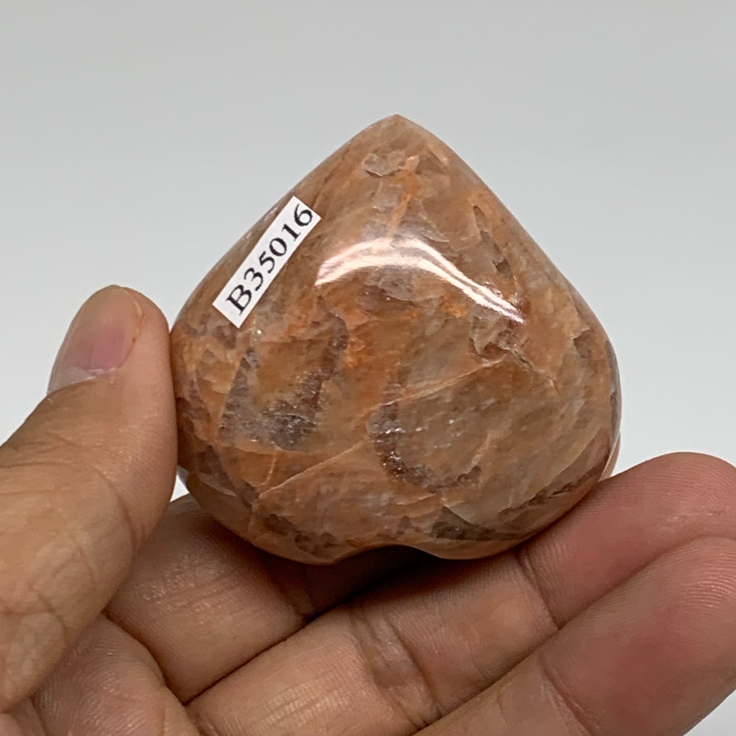 79.4g, 1.8"x1.9"x1.1", Peach Moonstone Heart Crystal Polished, B35016