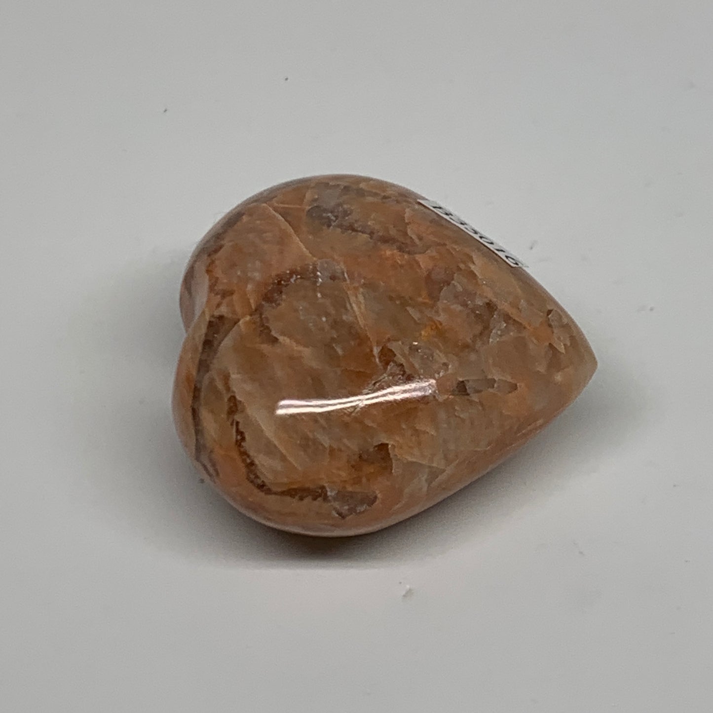 79.4g, 1.8"x1.9"x1.1", Peach Moonstone Heart Crystal Polished, B35016