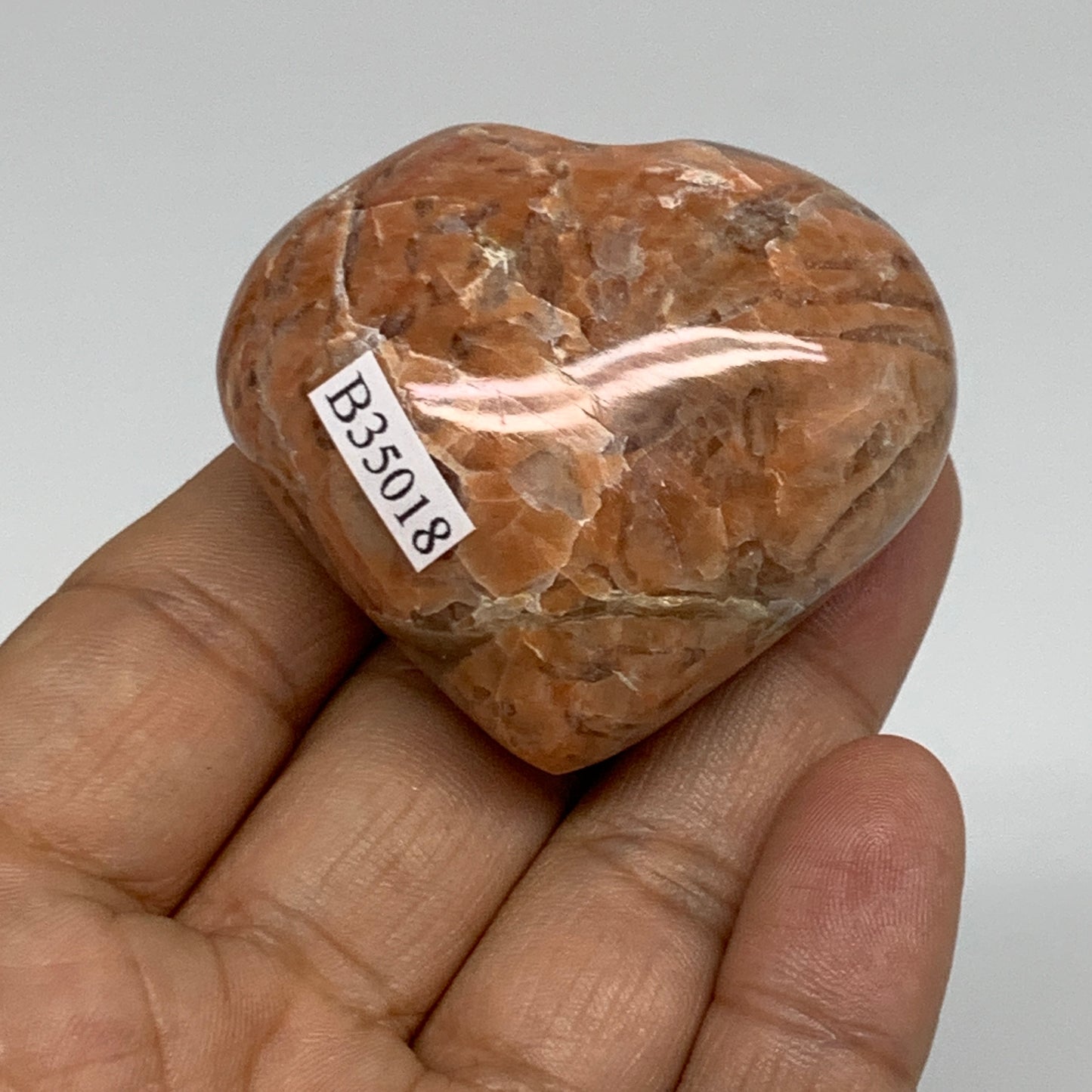 75.4g, 1.8"x2"x1", Peach Moonstone Heart Crystal Polished, B35018