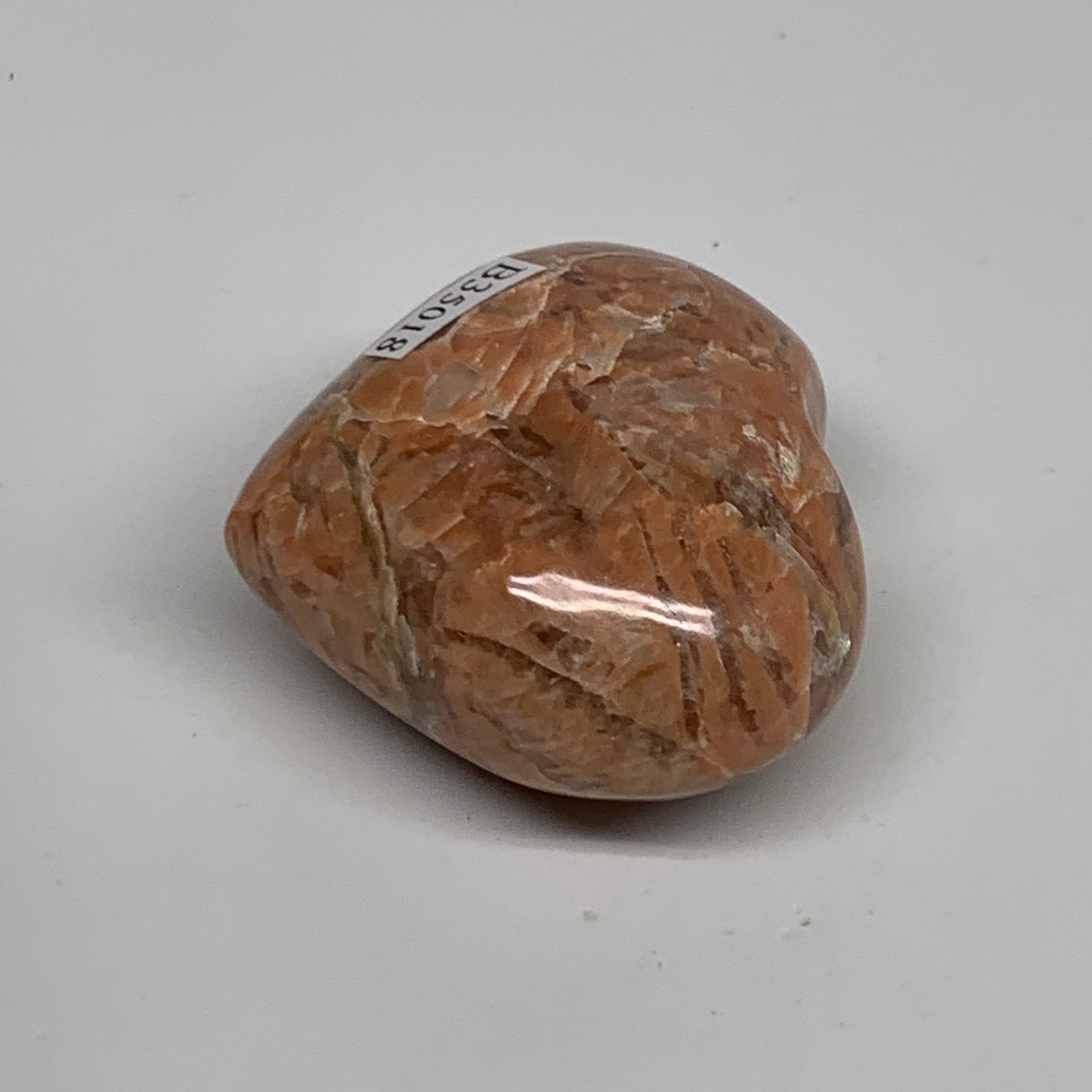 75.4g, 1.8"x2"x1", Peach Moonstone Heart Crystal Polished, B35018