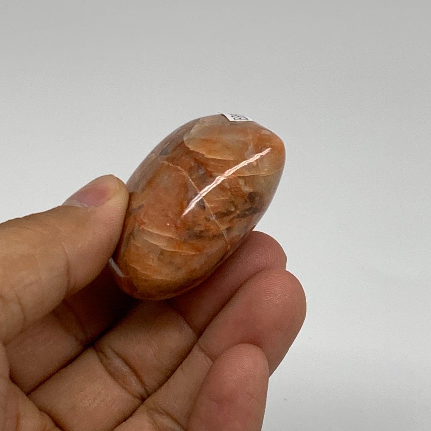 67.9g, 1.8"x2"x0.9", Peach Moonstone Heart Crystal Polished, B35020