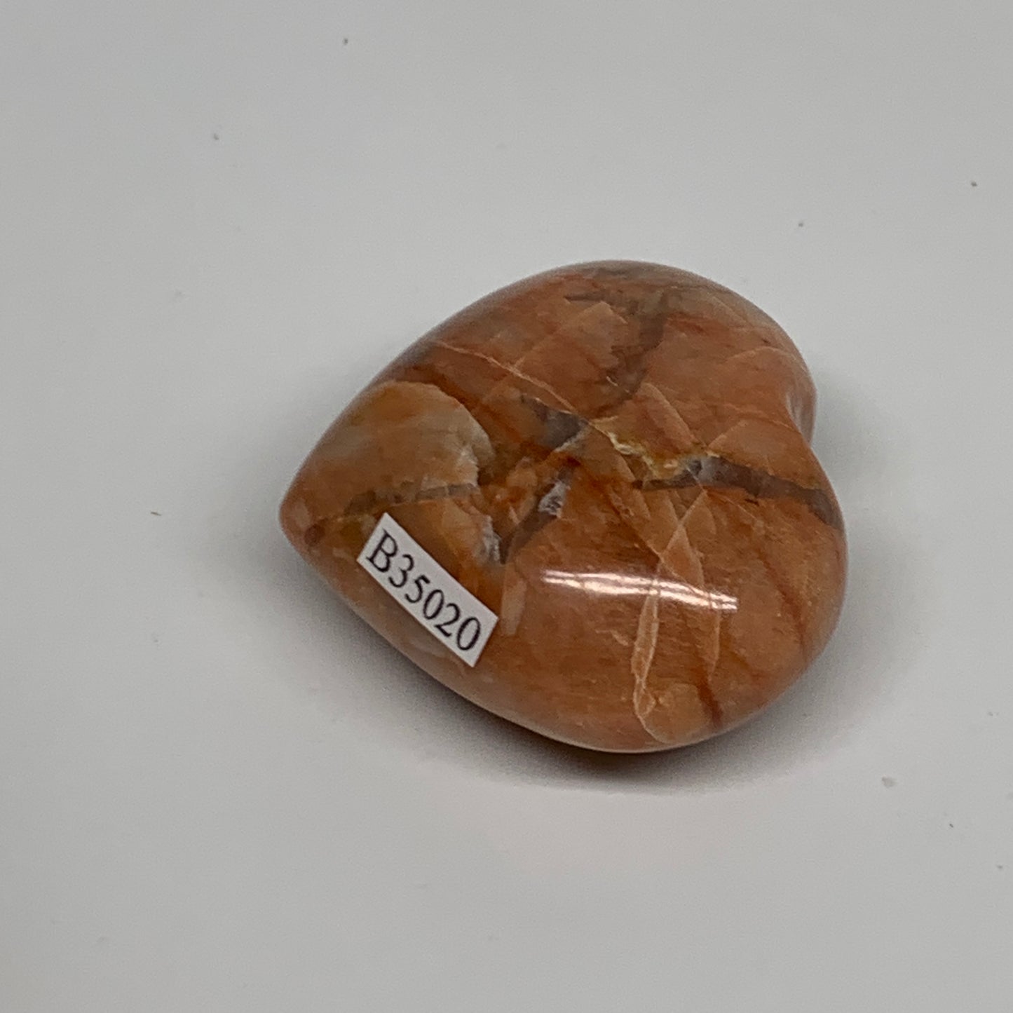 67.9g, 1.8"x2"x0.9", Peach Moonstone Heart Crystal Polished, B35020