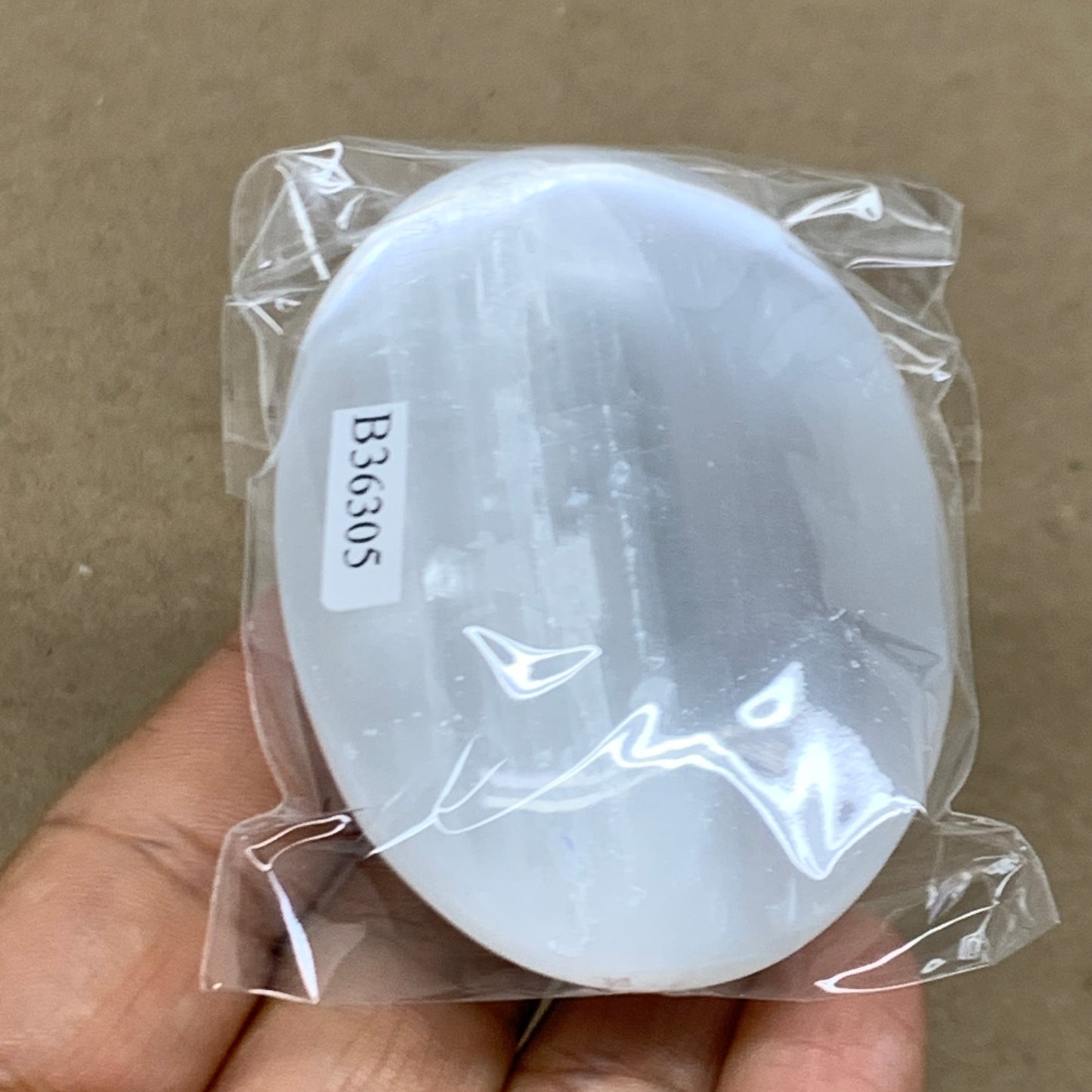 93g, 2.7"x1.9"x0.9", White Selenite Palmstone Crystal Pillow Reiki, B36305