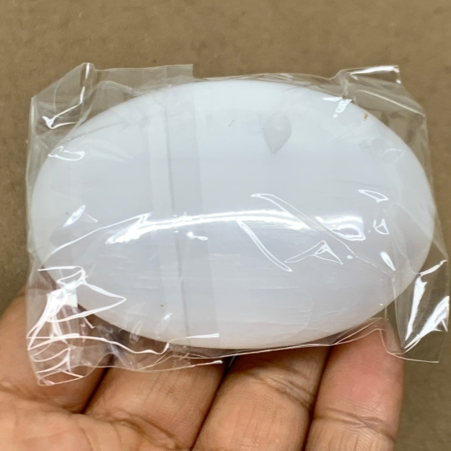 93g, 2.7"x1.9"x0.9", White Selenite Palmstone Crystal Pillow Reiki, B36305
