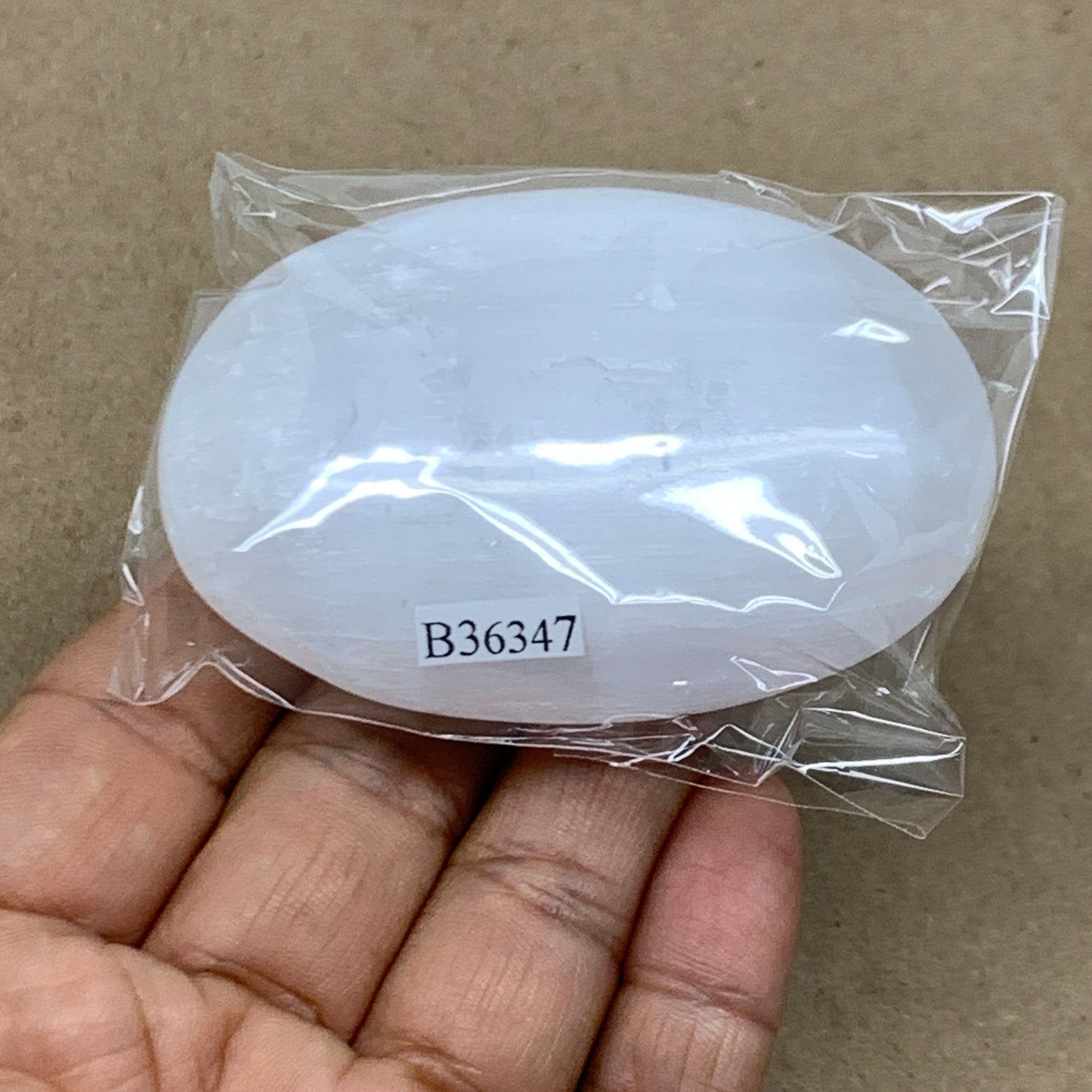 88g, 2.7"x1.9"x0.9", White Selenite Palmstone Crystal Pillow Reiki, B36347