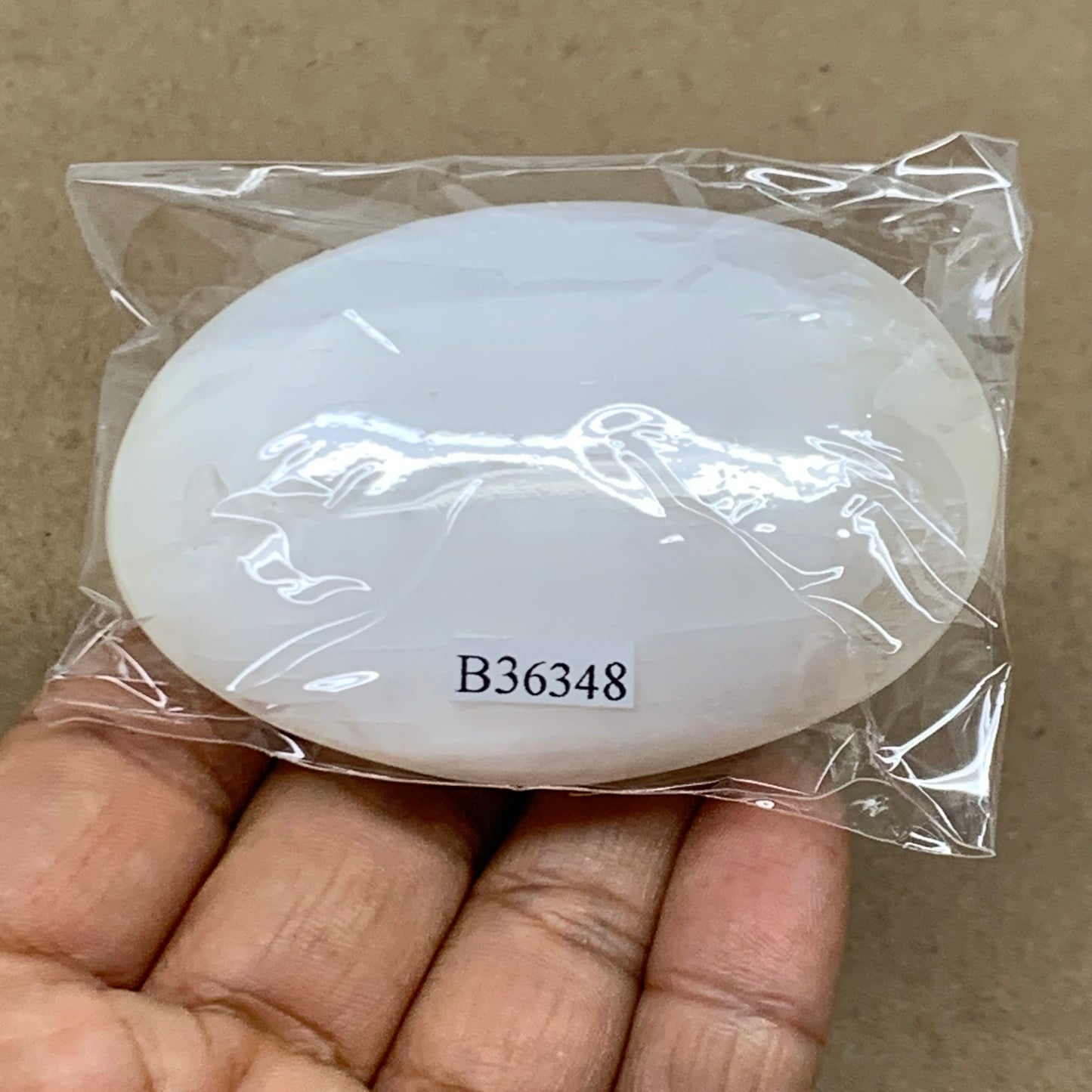 90g, 2.7"x1.8"x0.9", White Selenite Palmstone Crystal Pillow Reiki, B36348