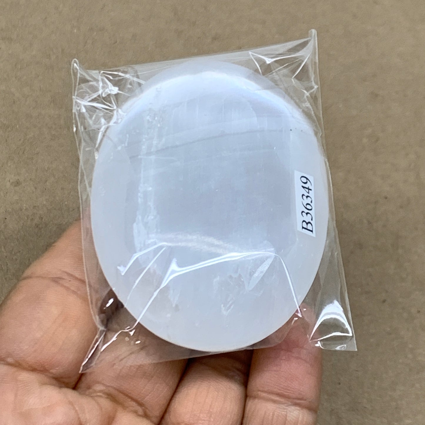 90g, 2.7"x1.9"x1", White Selenite Palmstone Crystal Pillow Reiki, B36349