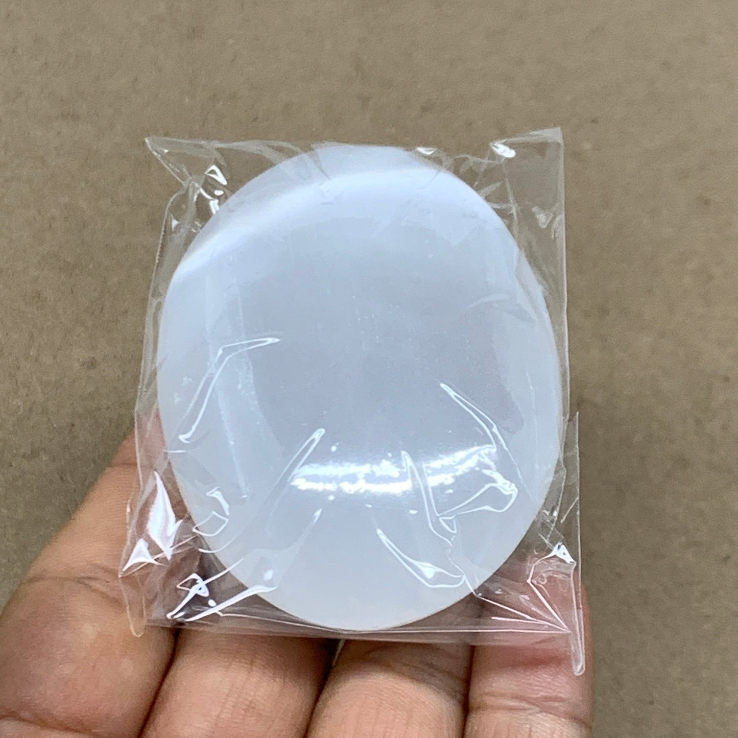 90g, 2.7"x1.9"x1", White Selenite Palmstone Crystal Pillow Reiki, B36349