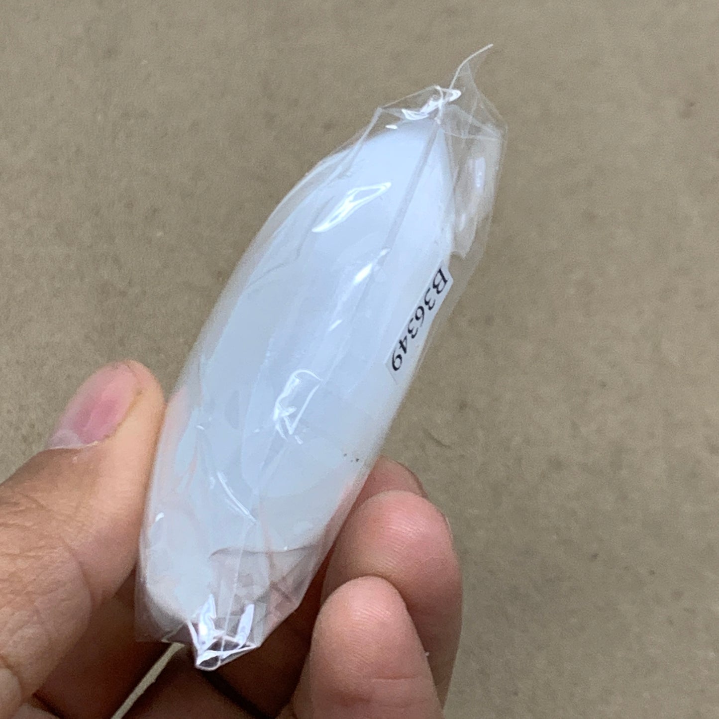 90g, 2.7"x1.9"x1", White Selenite Palmstone Crystal Pillow Reiki, B36349