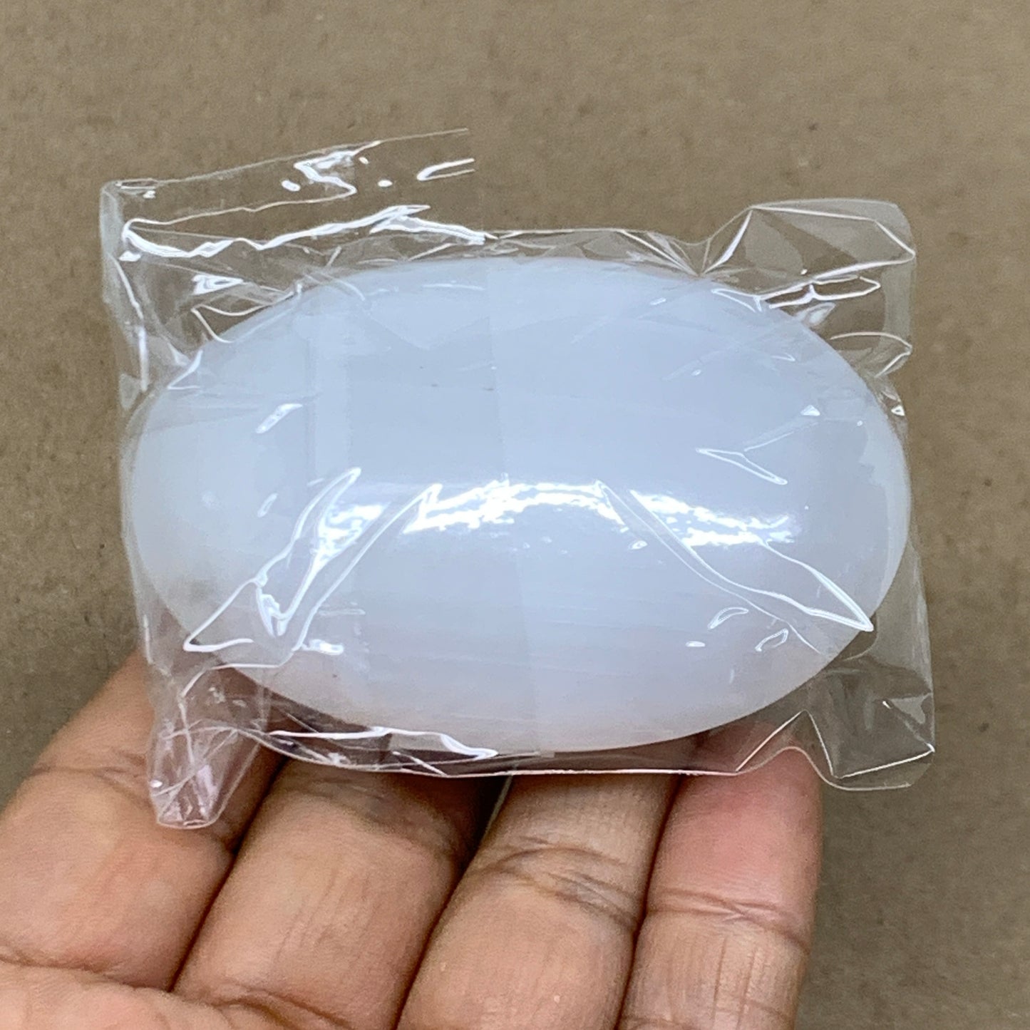 87g, 2.7"x1.9"x0.9", White Selenite Palmstone Crystal Pillow Reiki, B36350