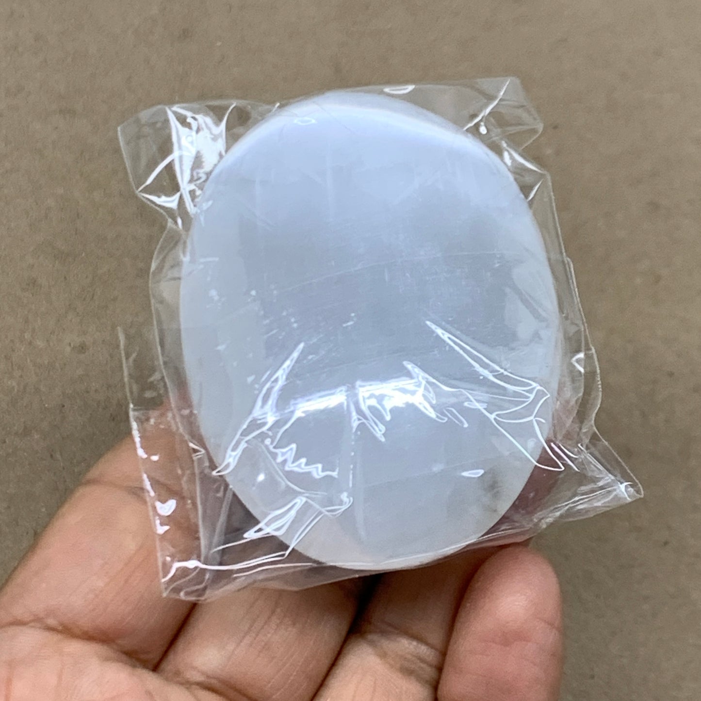 87g, 2.7"x1.9"x0.9", White Selenite Palmstone Crystal Pillow Reiki, B36350