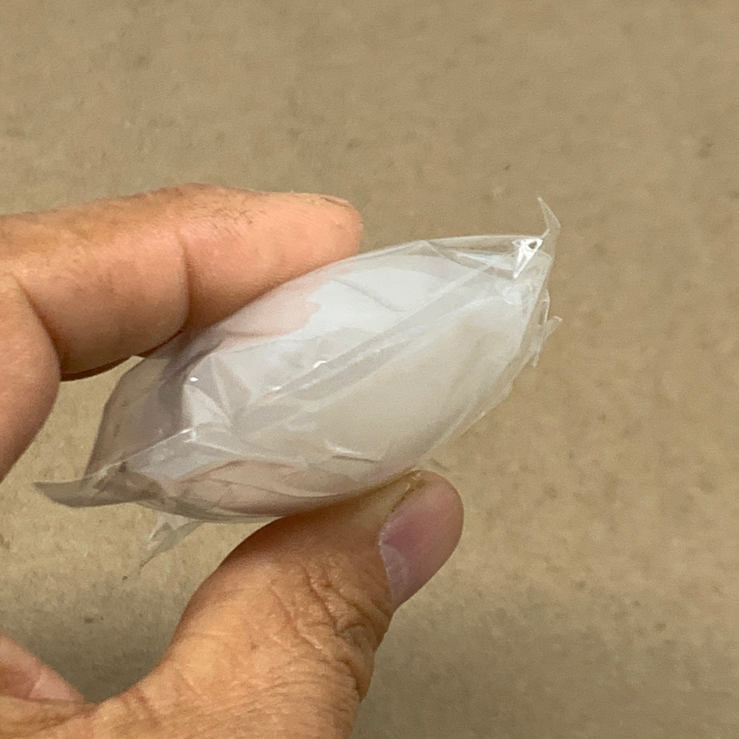 87g, 2.7"x1.9"x0.9", White Selenite Palmstone Crystal Pillow Reiki, B36350