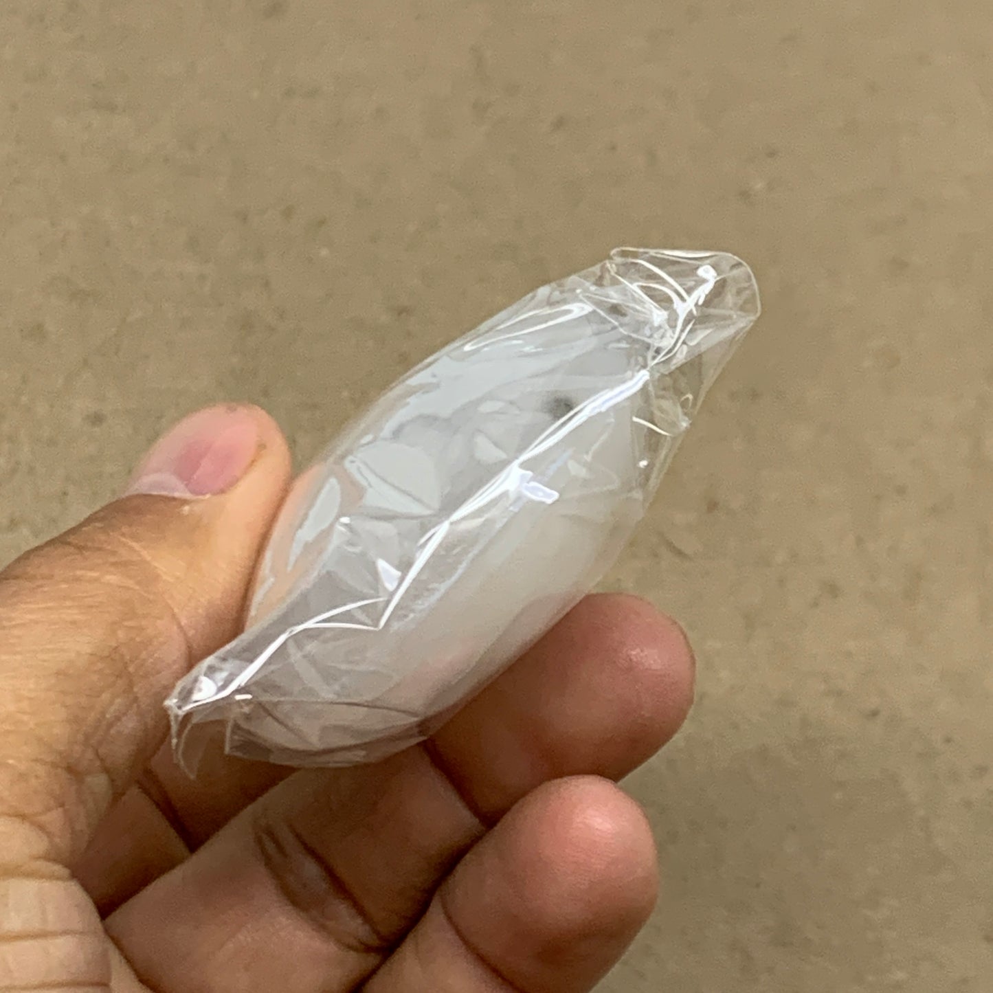 87g, 2.7"x1.9"x0.9", White Selenite Palmstone Crystal Pillow Reiki, B36350