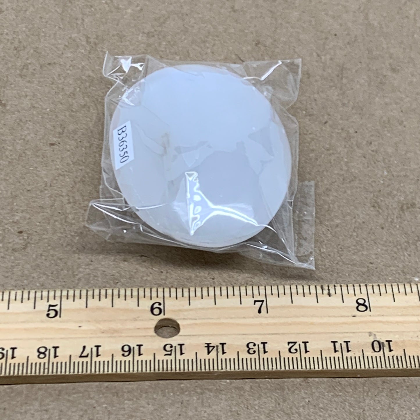 87g, 2.7"x1.9"x0.9", White Selenite Palmstone Crystal Pillow Reiki, B36350