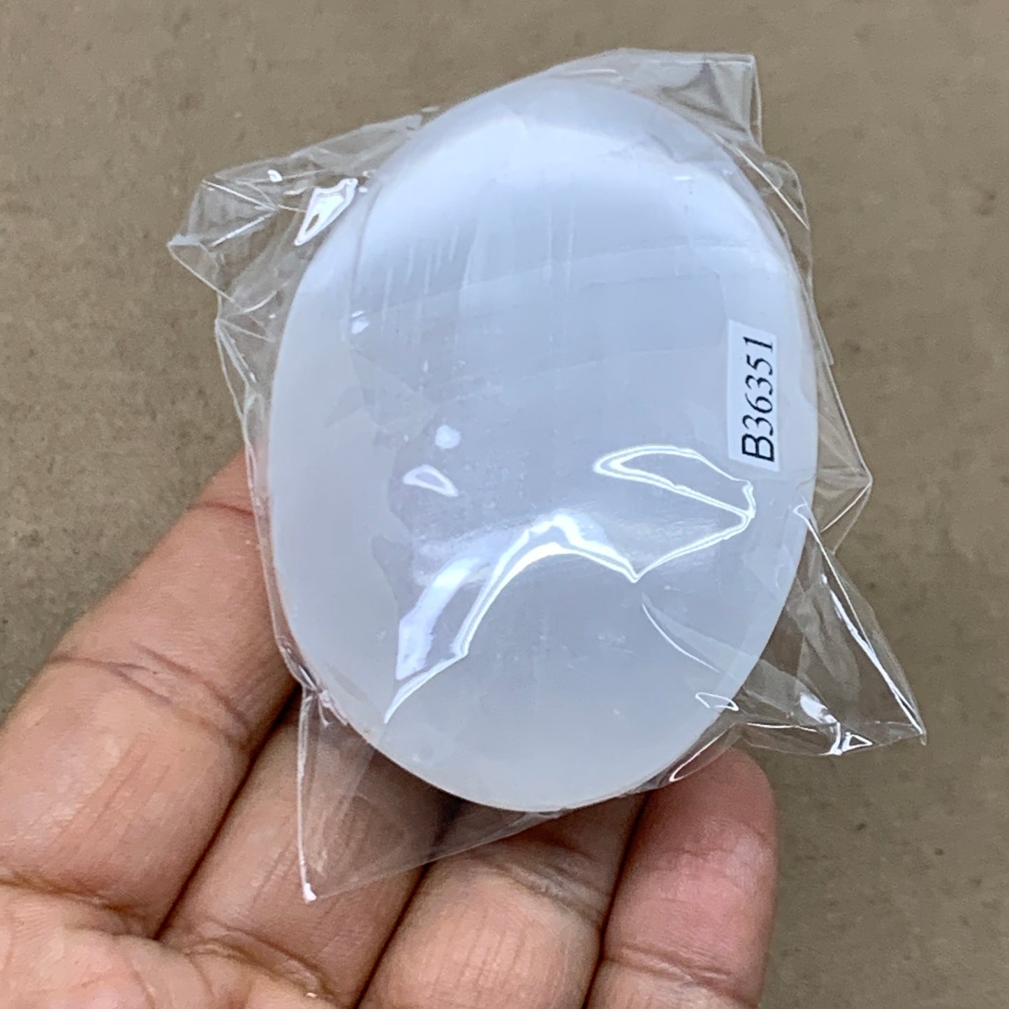 93g, 2.7"x1.9"x1", White Selenite Palmstone Crystal Pillow Reiki, B36351