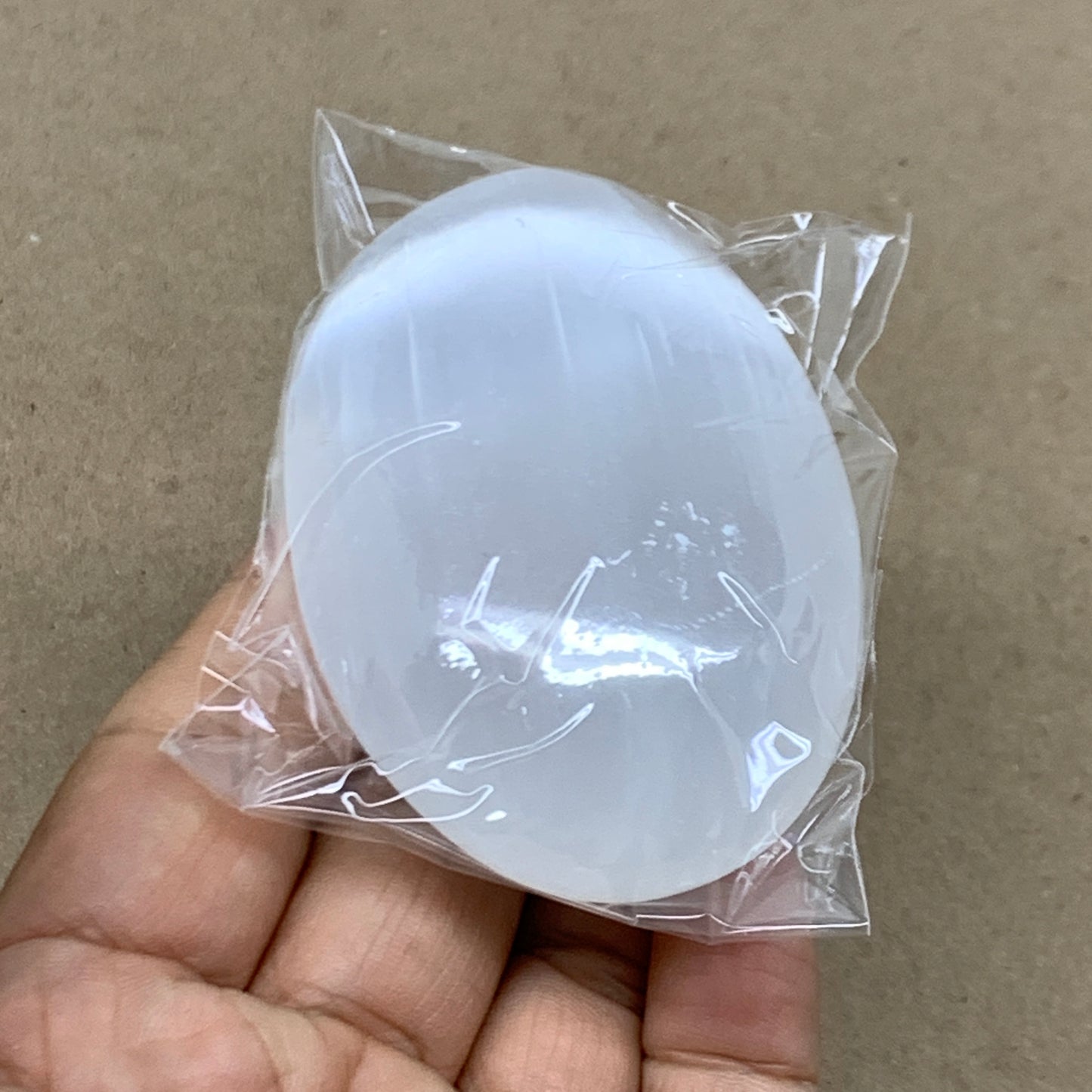 93g, 2.7"x1.9"x1", White Selenite Palmstone Crystal Pillow Reiki, B36351