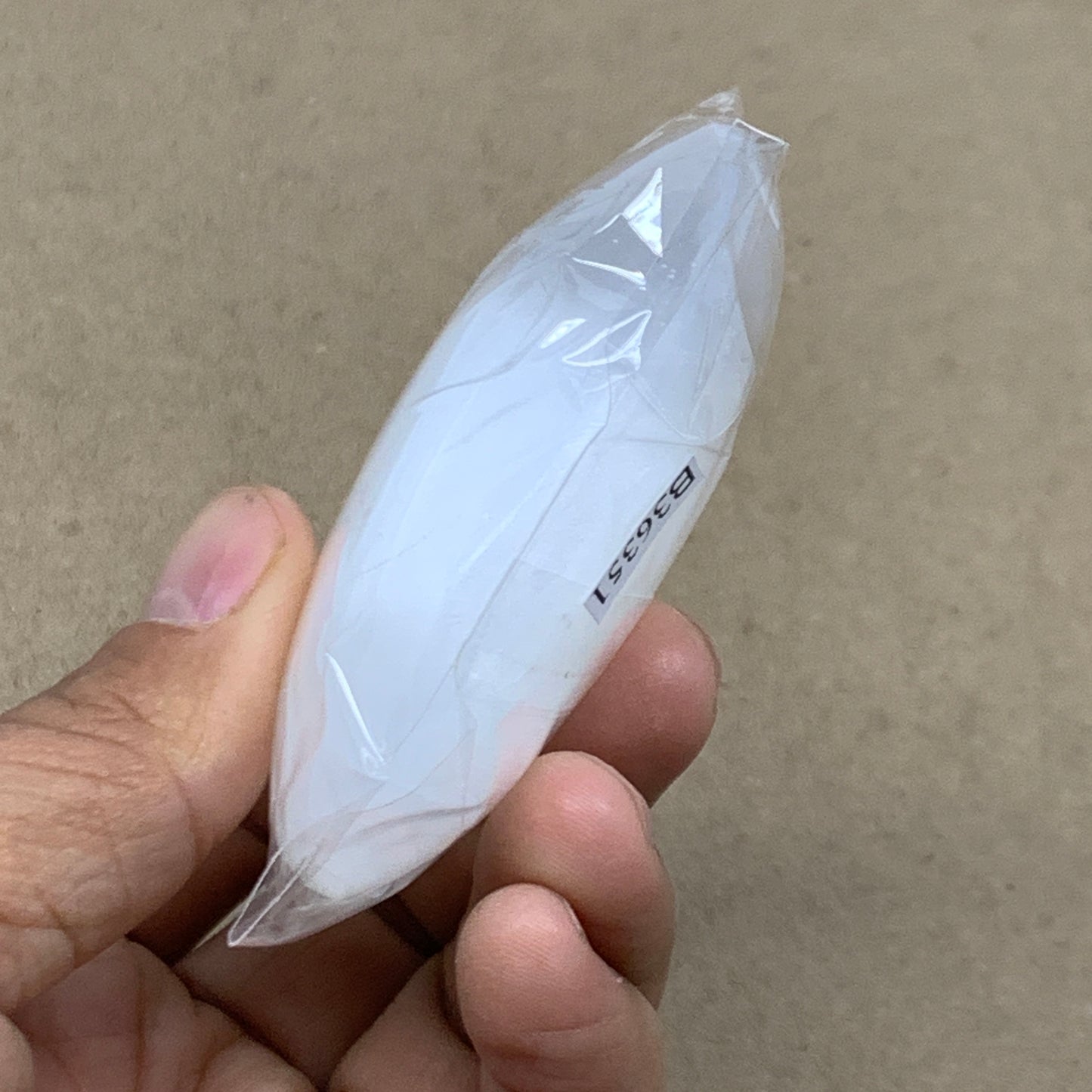 93g, 2.7"x1.9"x1", White Selenite Palmstone Crystal Pillow Reiki, B36351