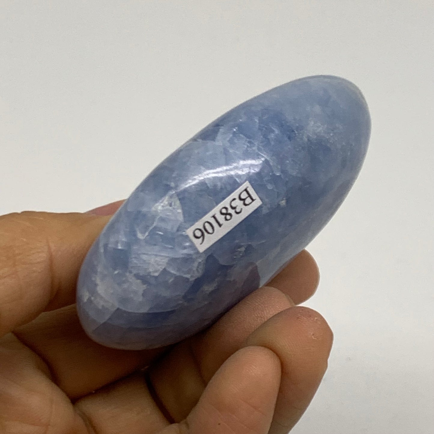 126g, 2.8"x1.8"x1" Blue Calcite Palm-Stone Polished Tumbled, B38106
