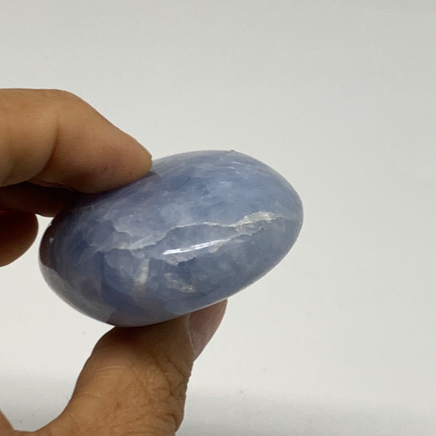 126g, 2.8"x1.8"x1" Blue Calcite Palm-Stone Polished Tumbled, B38106