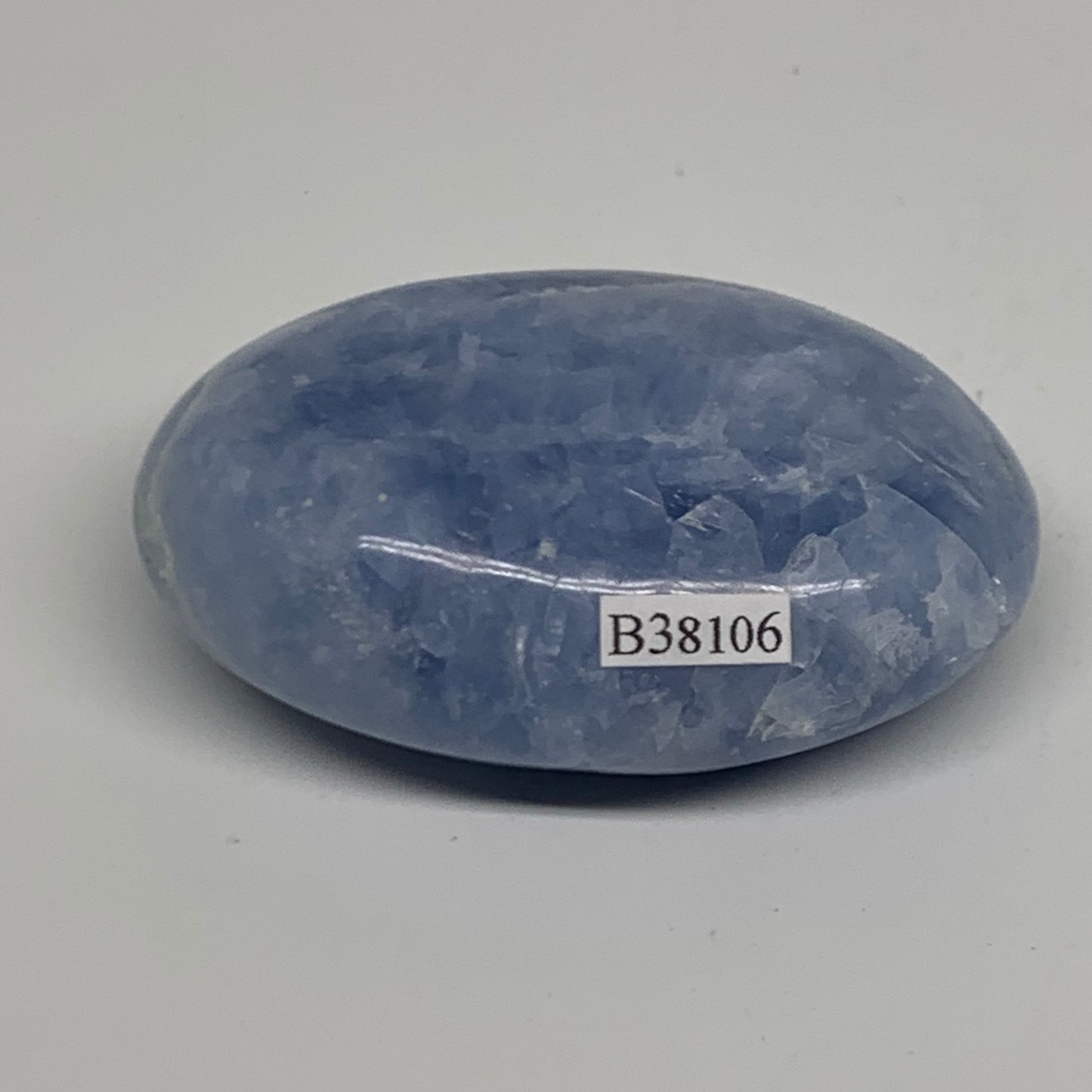 126g, 2.8"x1.8"x1" Blue Calcite Palm-Stone Polished Tumbled, B38106