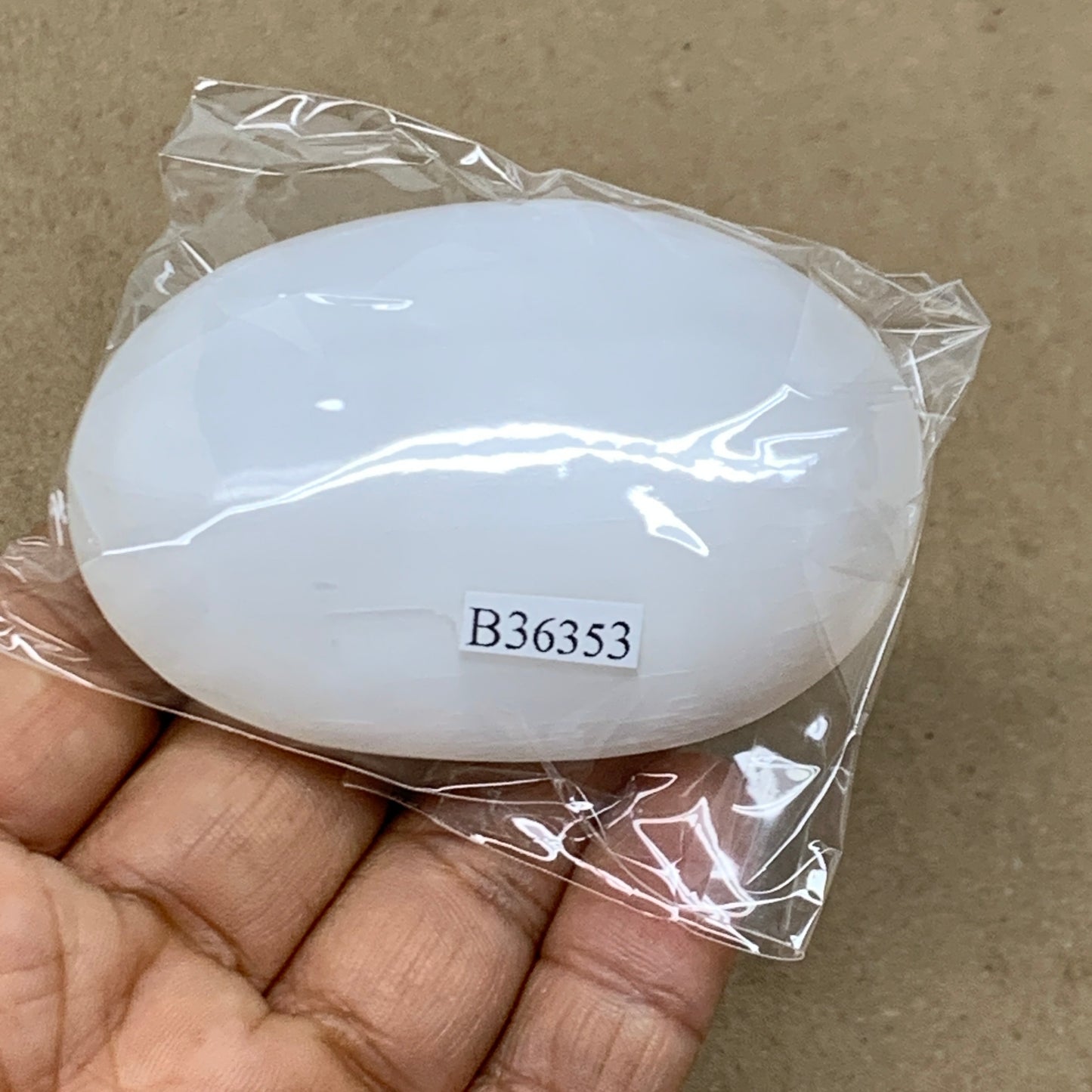 84g, 2.7"x1.9"x0.9", White Selenite Palmstone Crystal Pillow Reiki, B36353