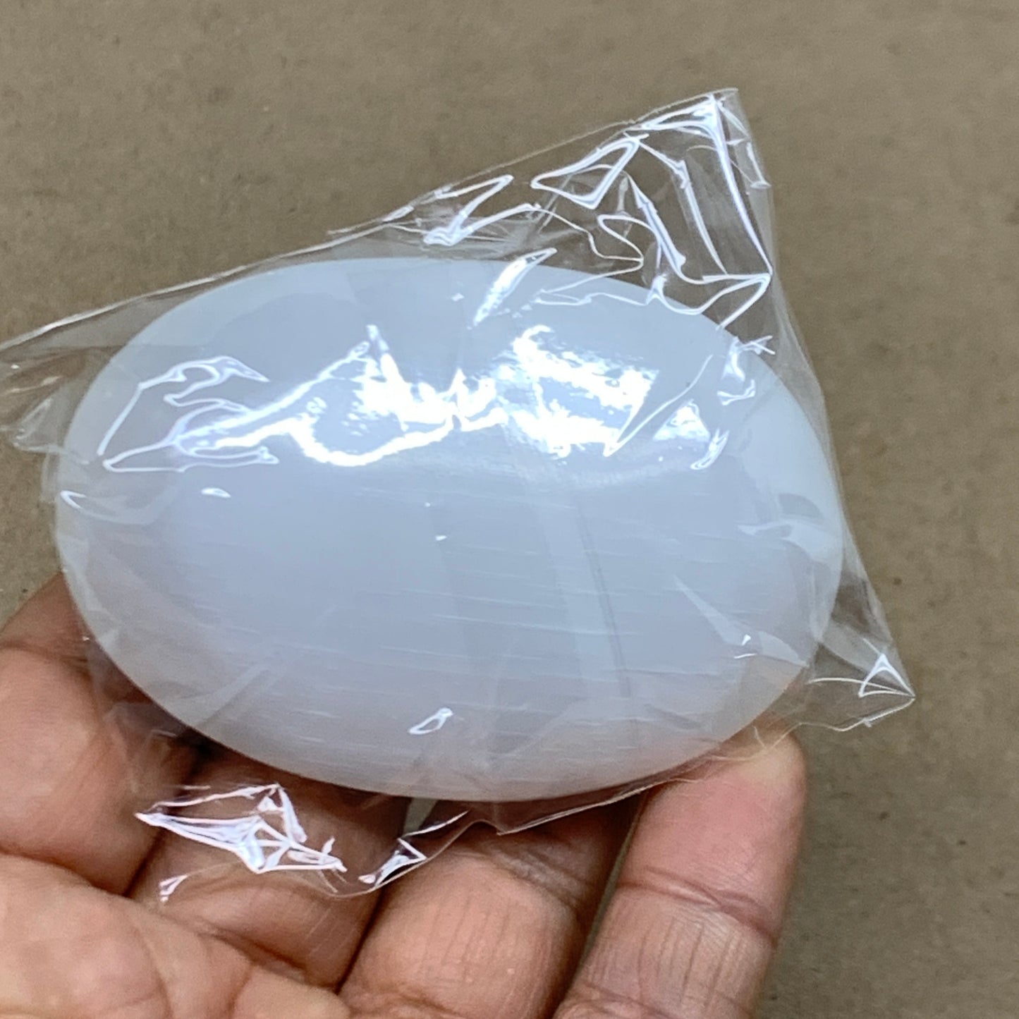 84g, 2.7"x1.9"x0.9", White Selenite Palmstone Crystal Pillow Reiki, B36353