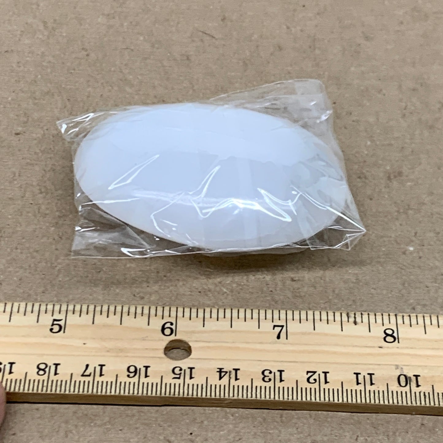 84g, 2.7"x1.9"x0.9", White Selenite Palmstone Crystal Pillow Reiki, B36353