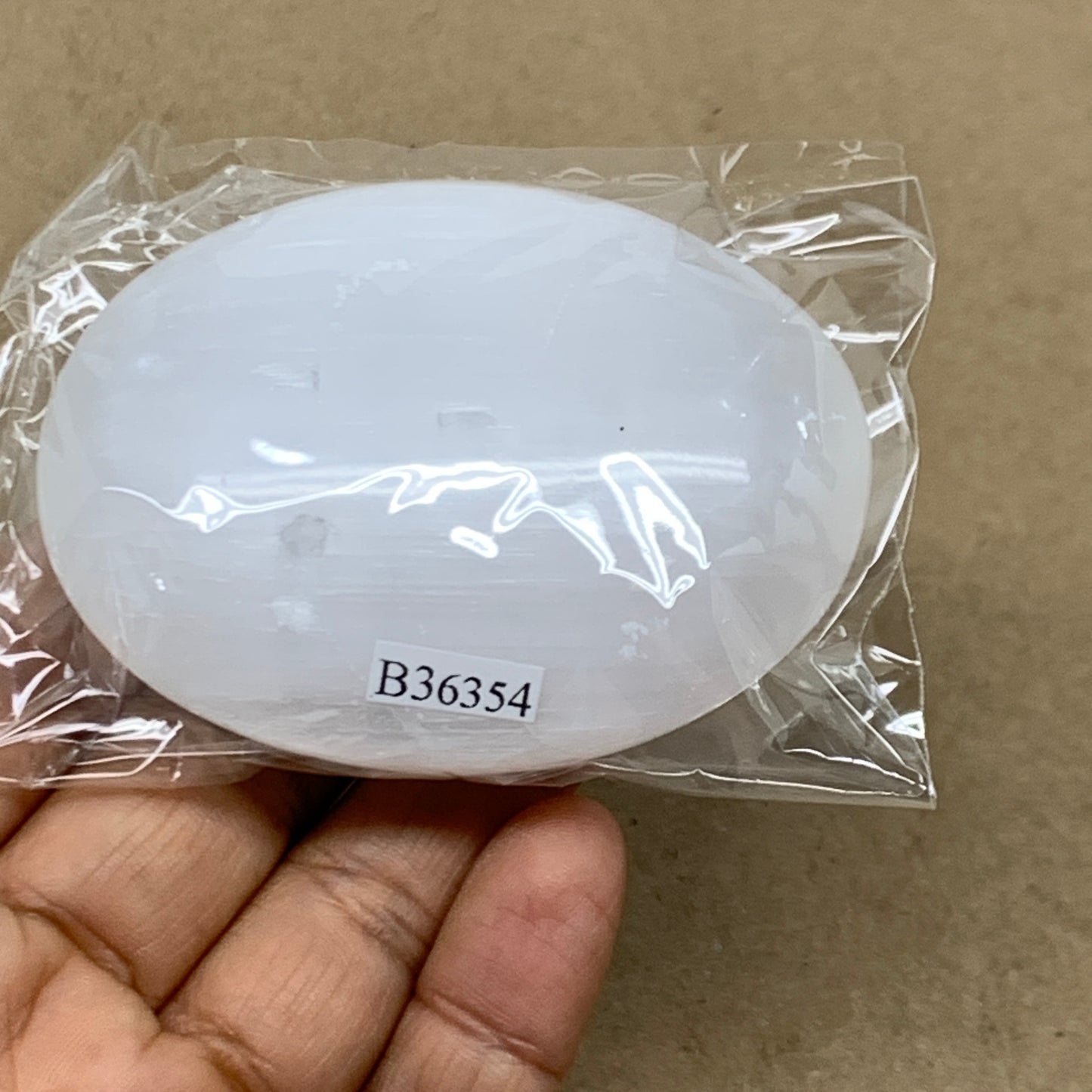 110g, 2.8"x2.1"x1", White Selenite Palmstone Crystal Pillow Reiki, B36354