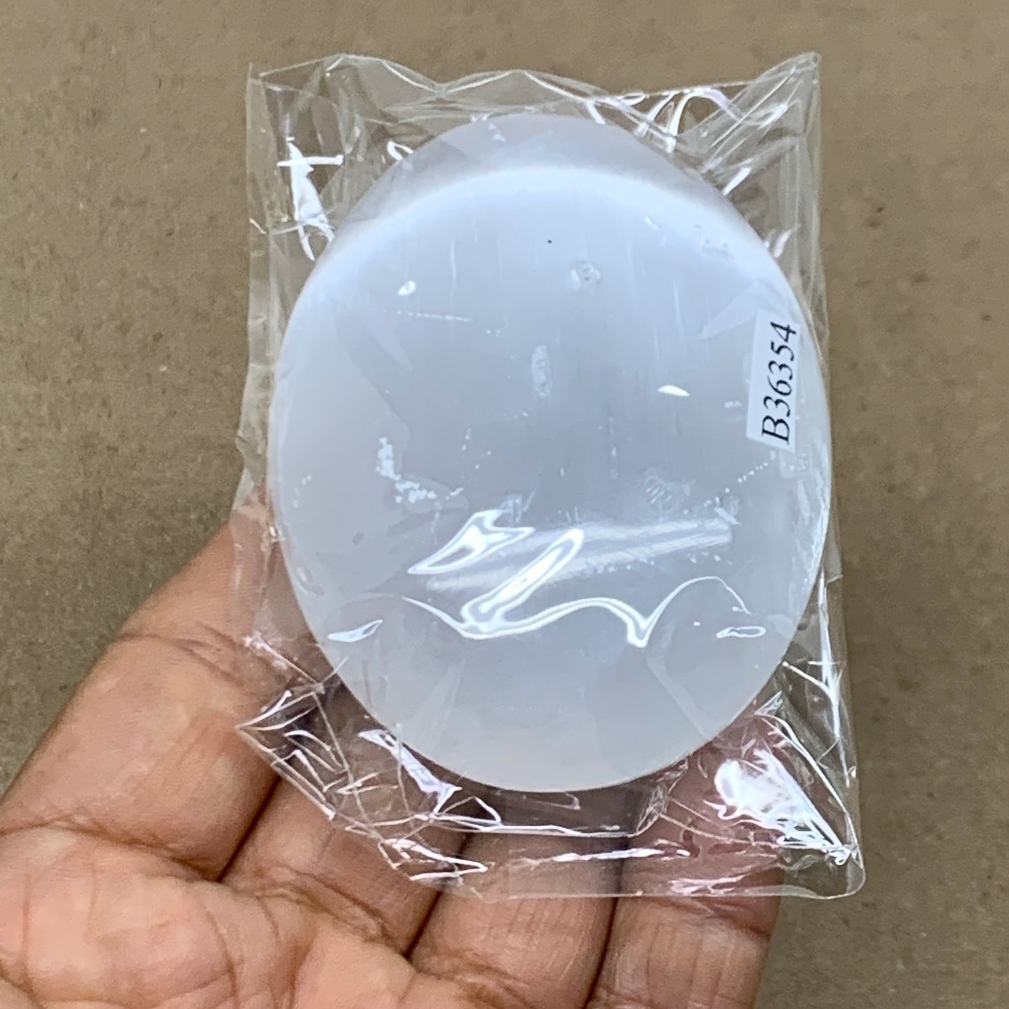 110g, 2.8"x2.1"x1", White Selenite Palmstone Crystal Pillow Reiki, B36354