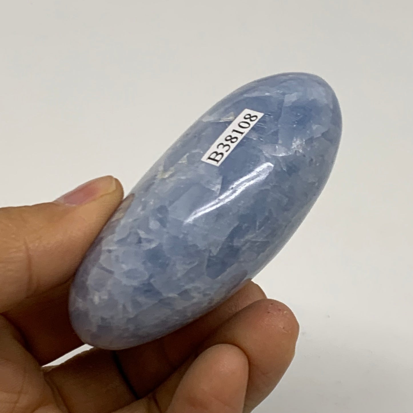 159.9g, 2.8"x2"x1.2" Blue Calcite Palm-Stone Polished Tumbled, B38108