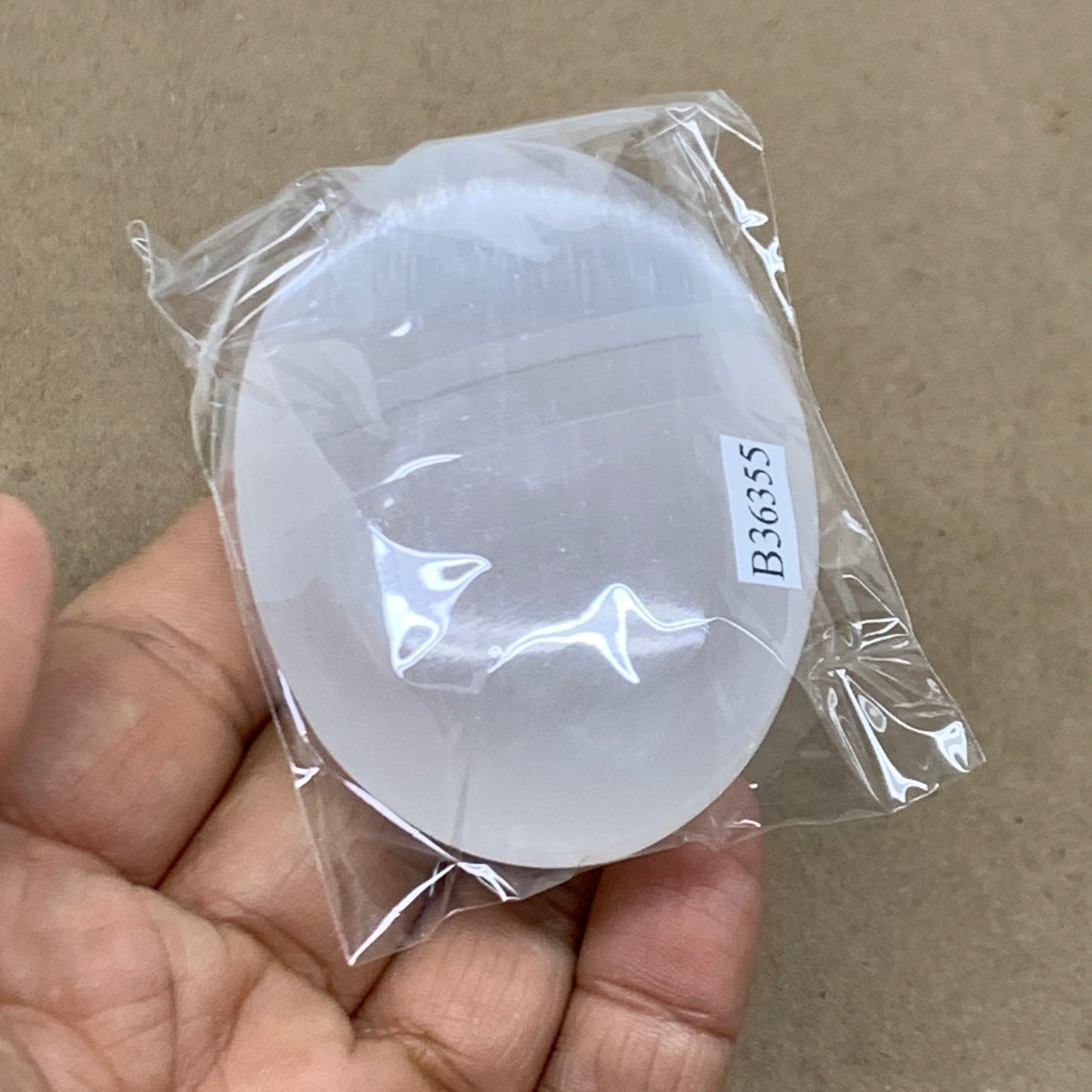 86g, 2.7"x1.9"x0.9", White Selenite Palmstone Crystal Pillow Reiki, B36355