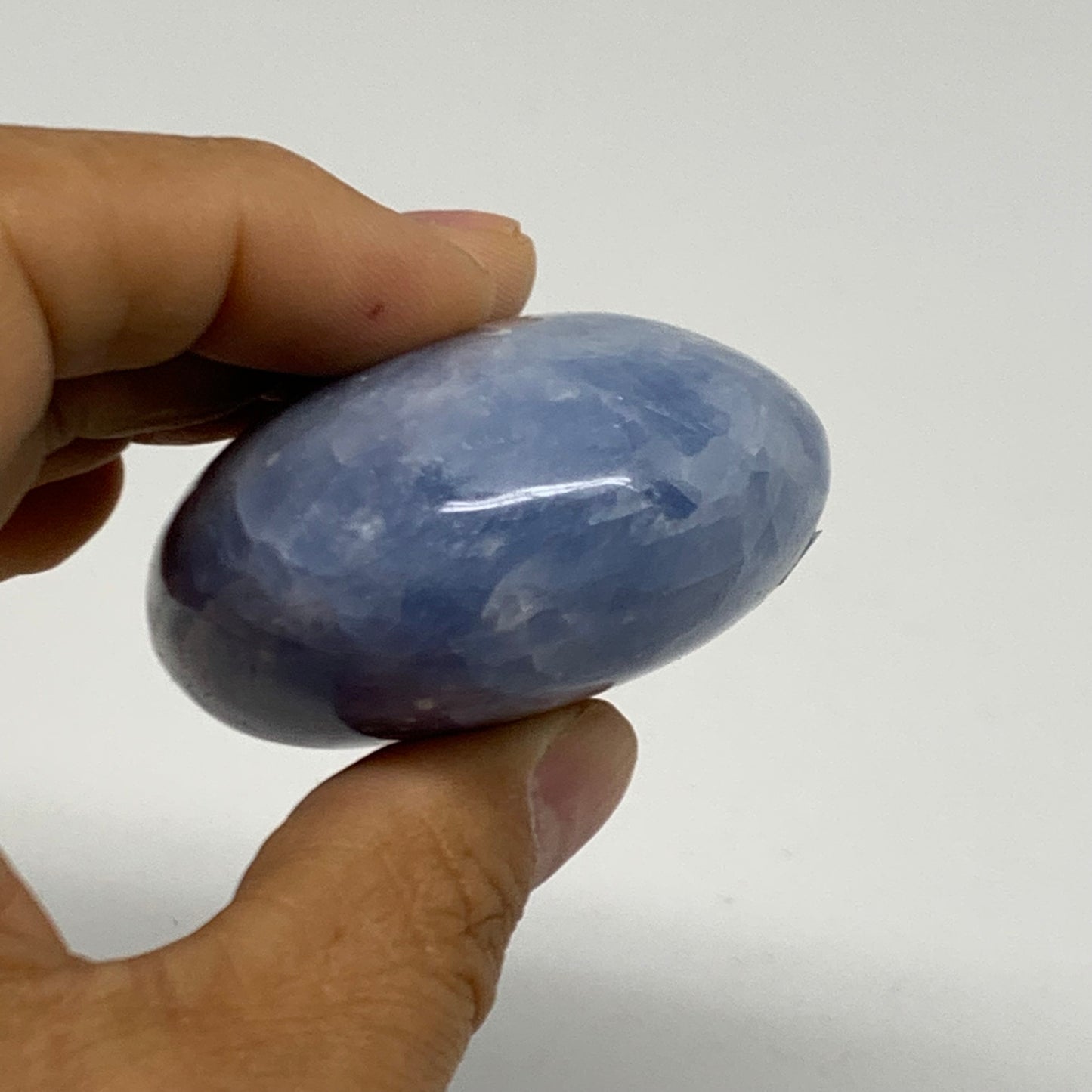 159.9g, 2.8"x2"x1.2" Blue Calcite Palm-Stone Polished Tumbled, B38108