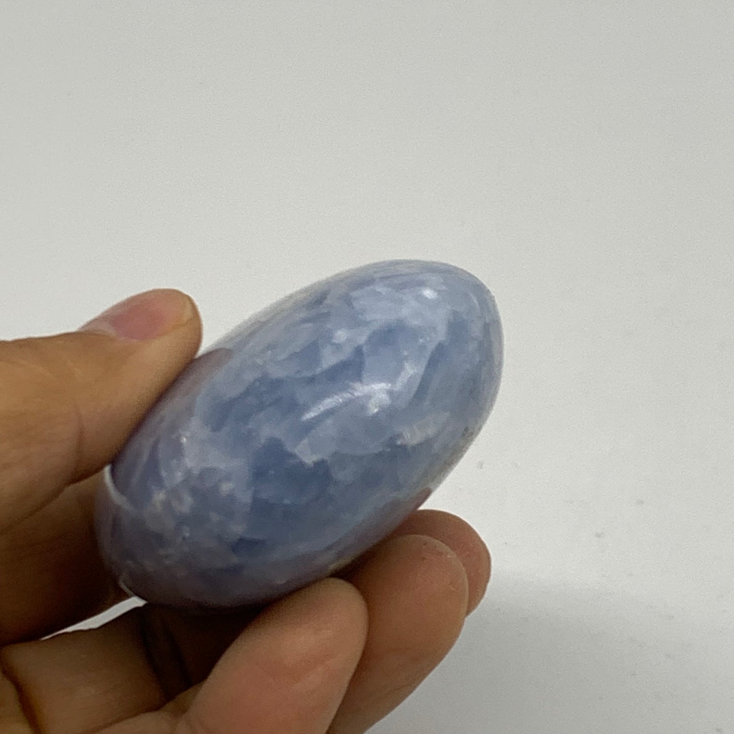 159.9g, 2.8"x2"x1.2" Blue Calcite Palm-Stone Polished Tumbled, B38108