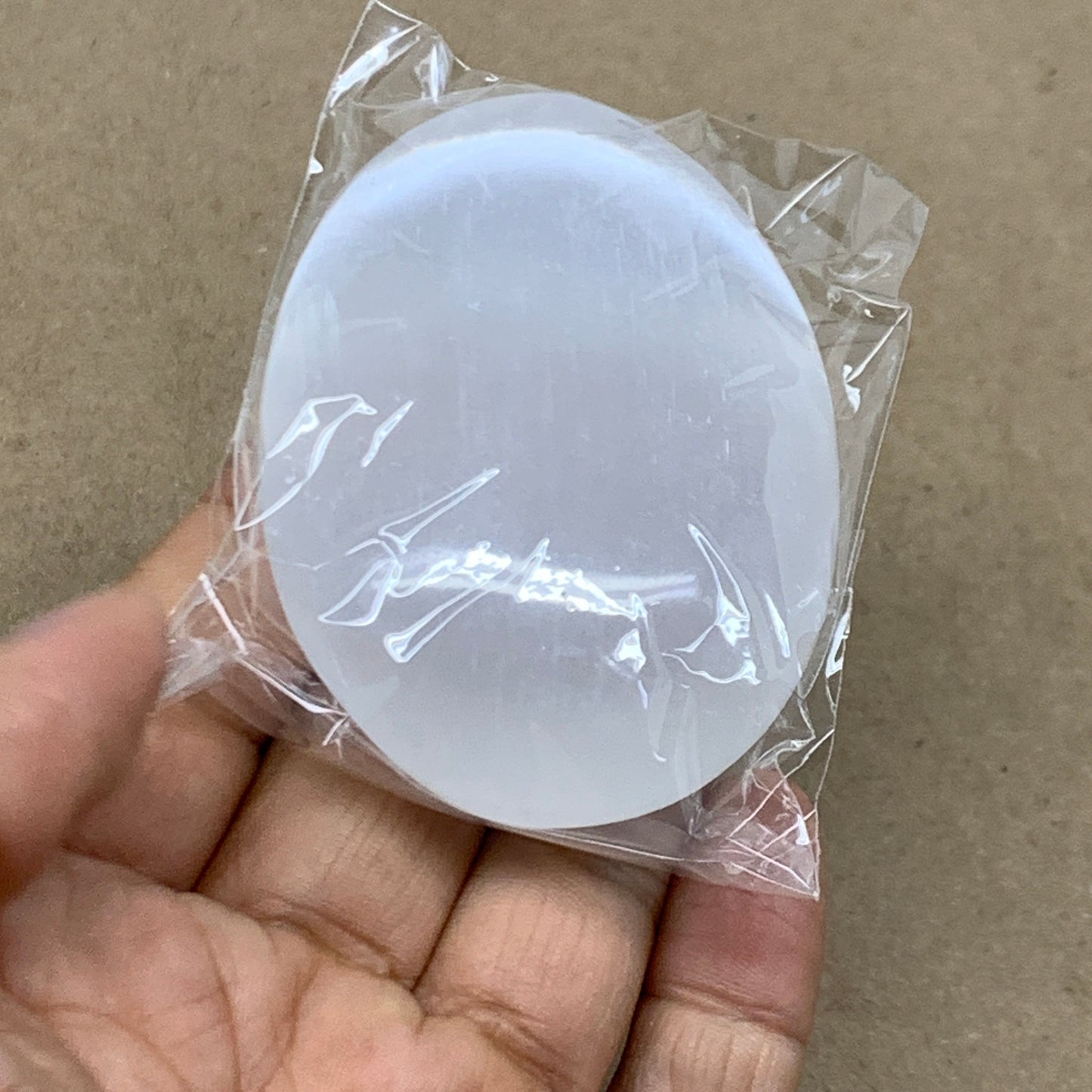 86g, 2.7"x1.9"x0.9", White Selenite Palmstone Crystal Pillow Reiki, B36355