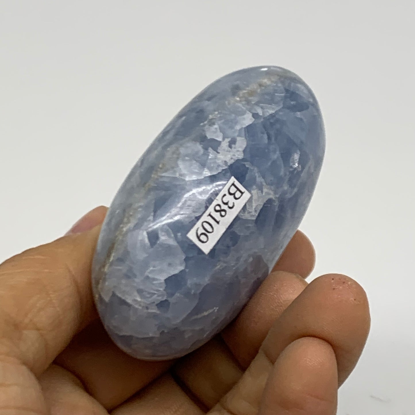 131.8g, 2.5"x1.7"x1.2" Blue Calcite Palm-Stone Polished Tumbled, B38109